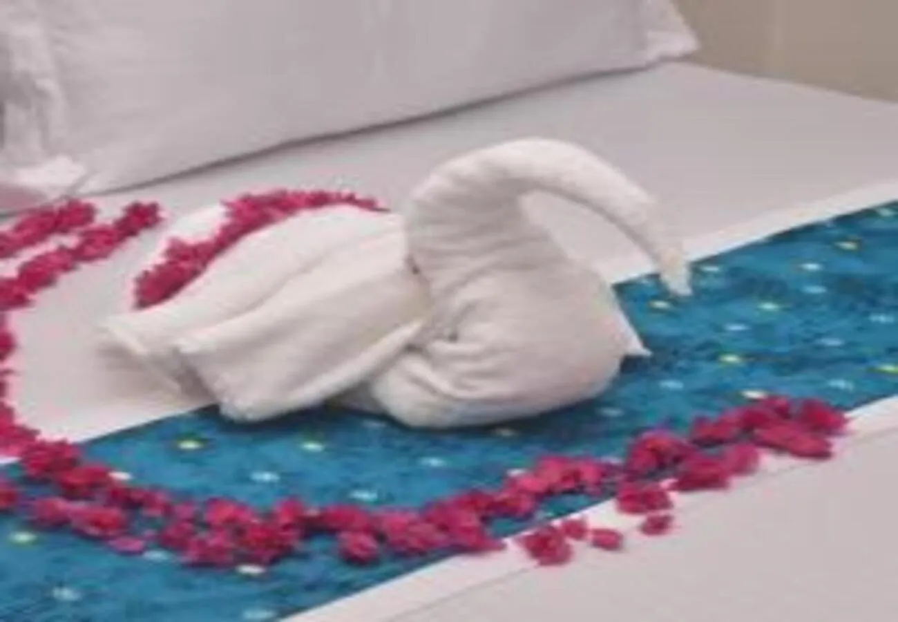 Bed in Utulivu Bungalow