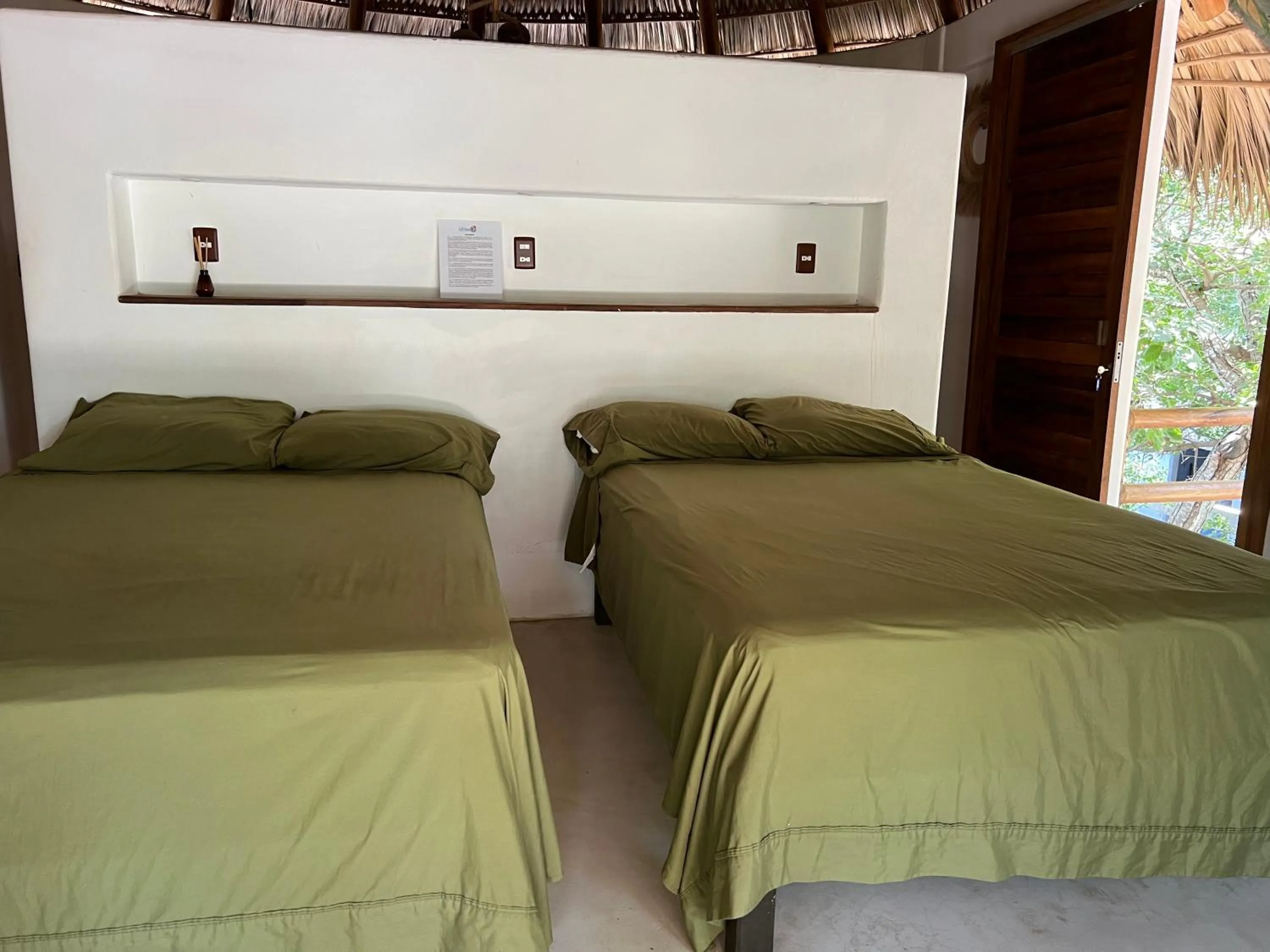 Bed in Cabañas las Palmas Chacahua