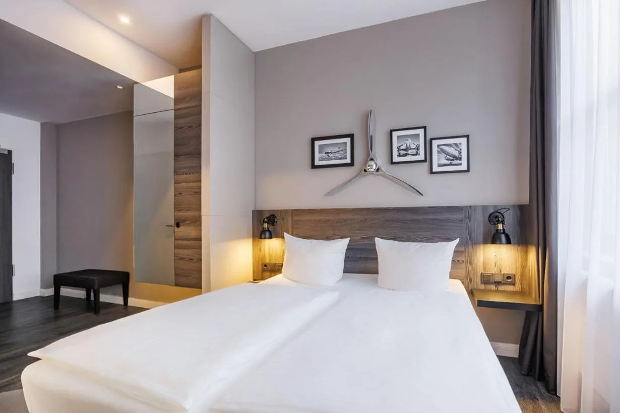 Photo of the whole room, Bed in Airporthotel Berlin-Adlershof