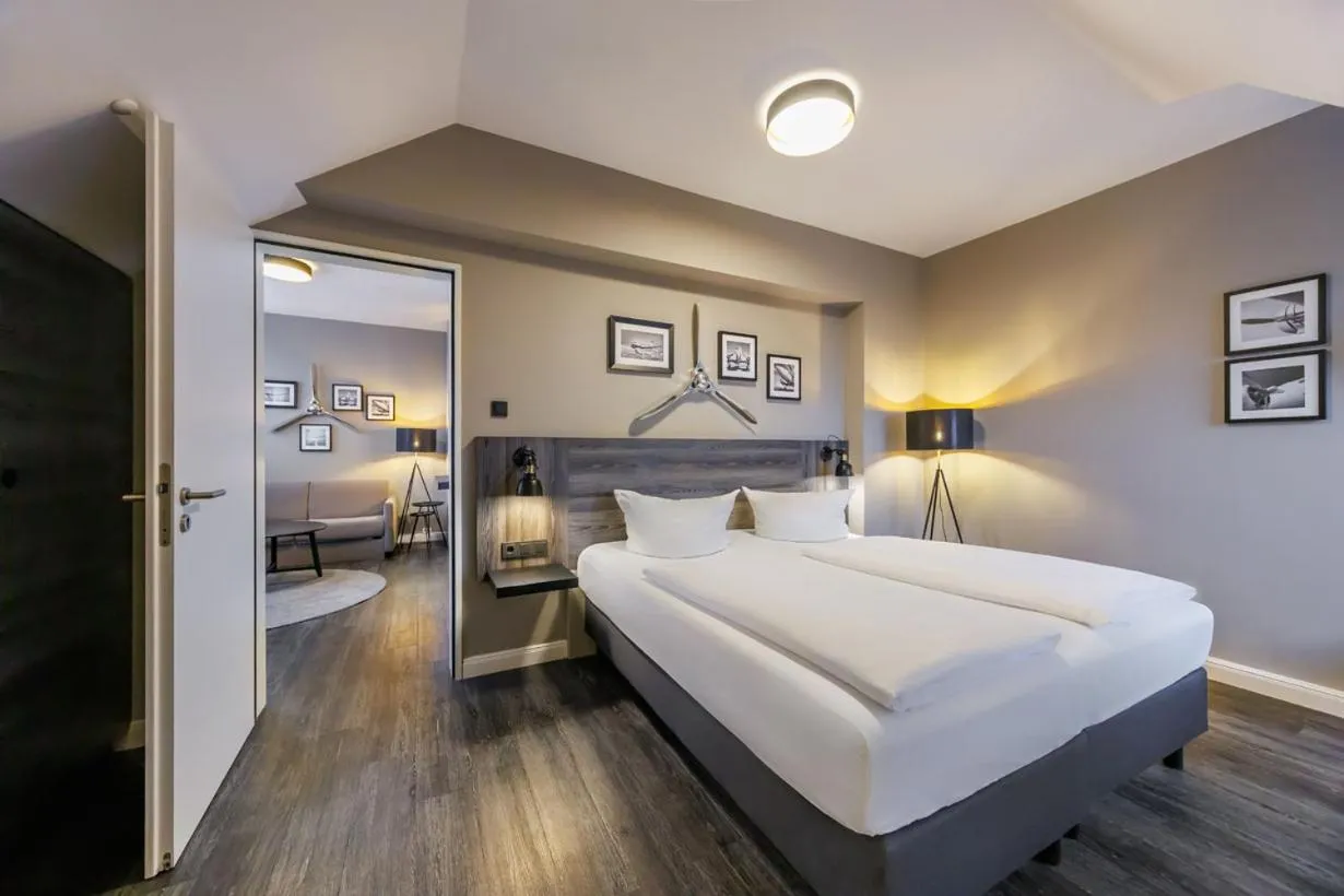 Photo of the whole room, Bed in Airporthotel Berlin-Adlershof