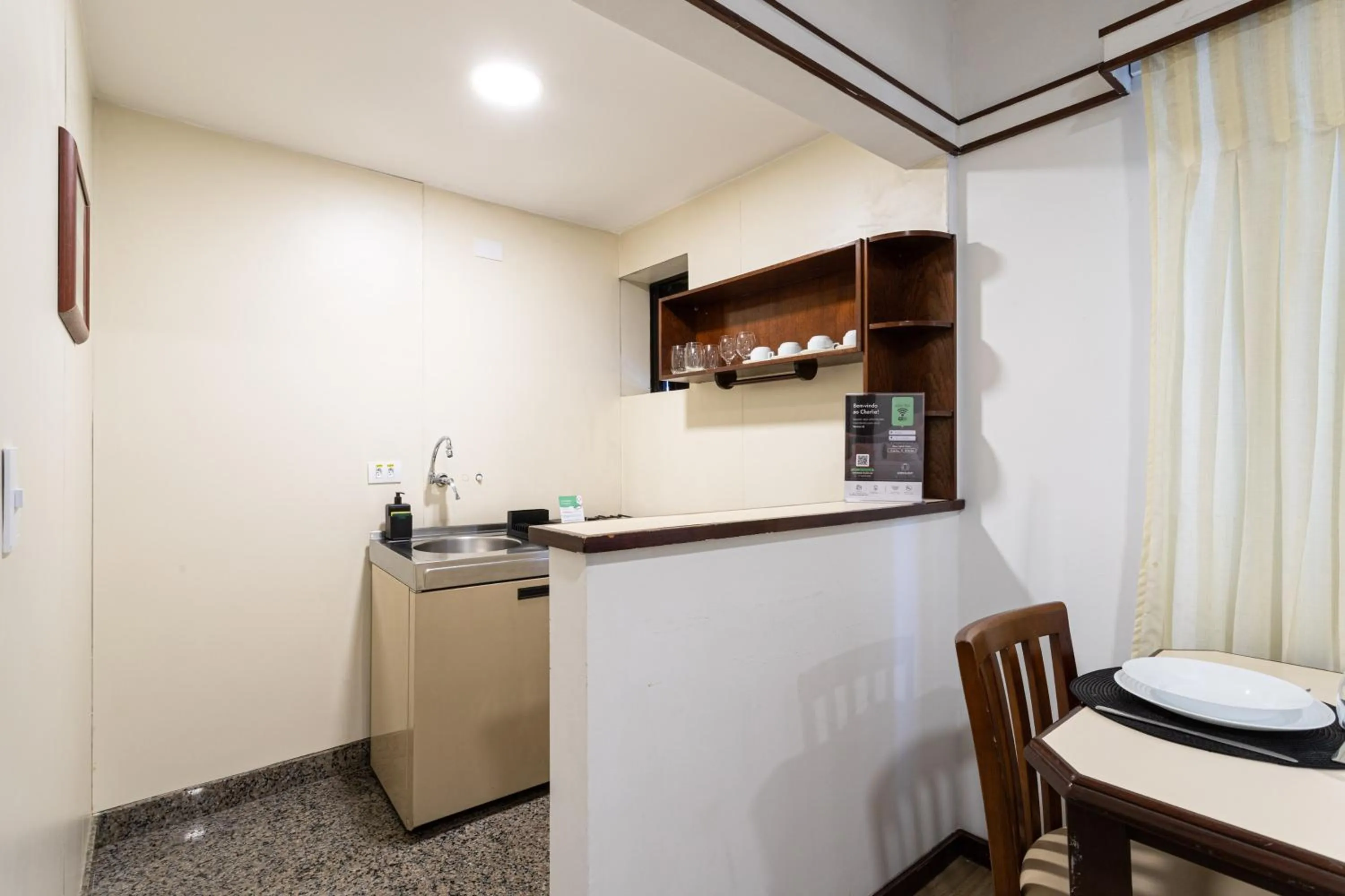 Kitchen or kitchenette in NewCiti Itaim by Charlie