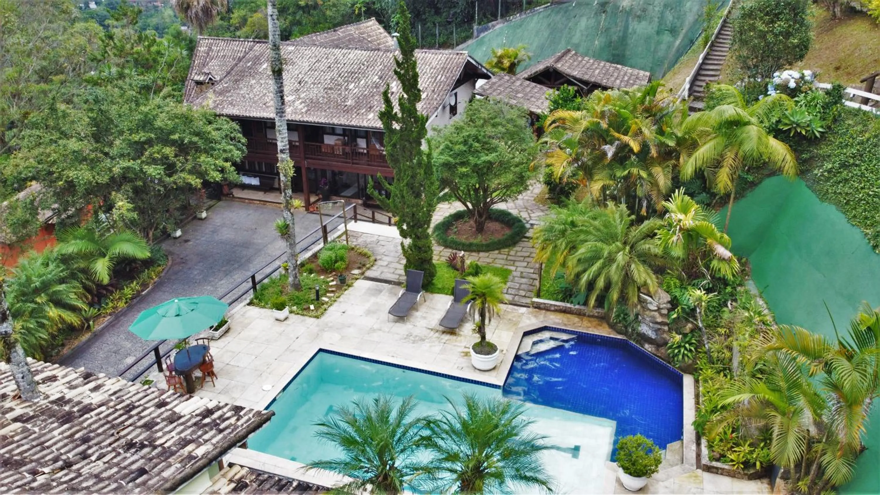 Swimming pool in POUSADA APOEMA PETRÓPOLIS-Rj