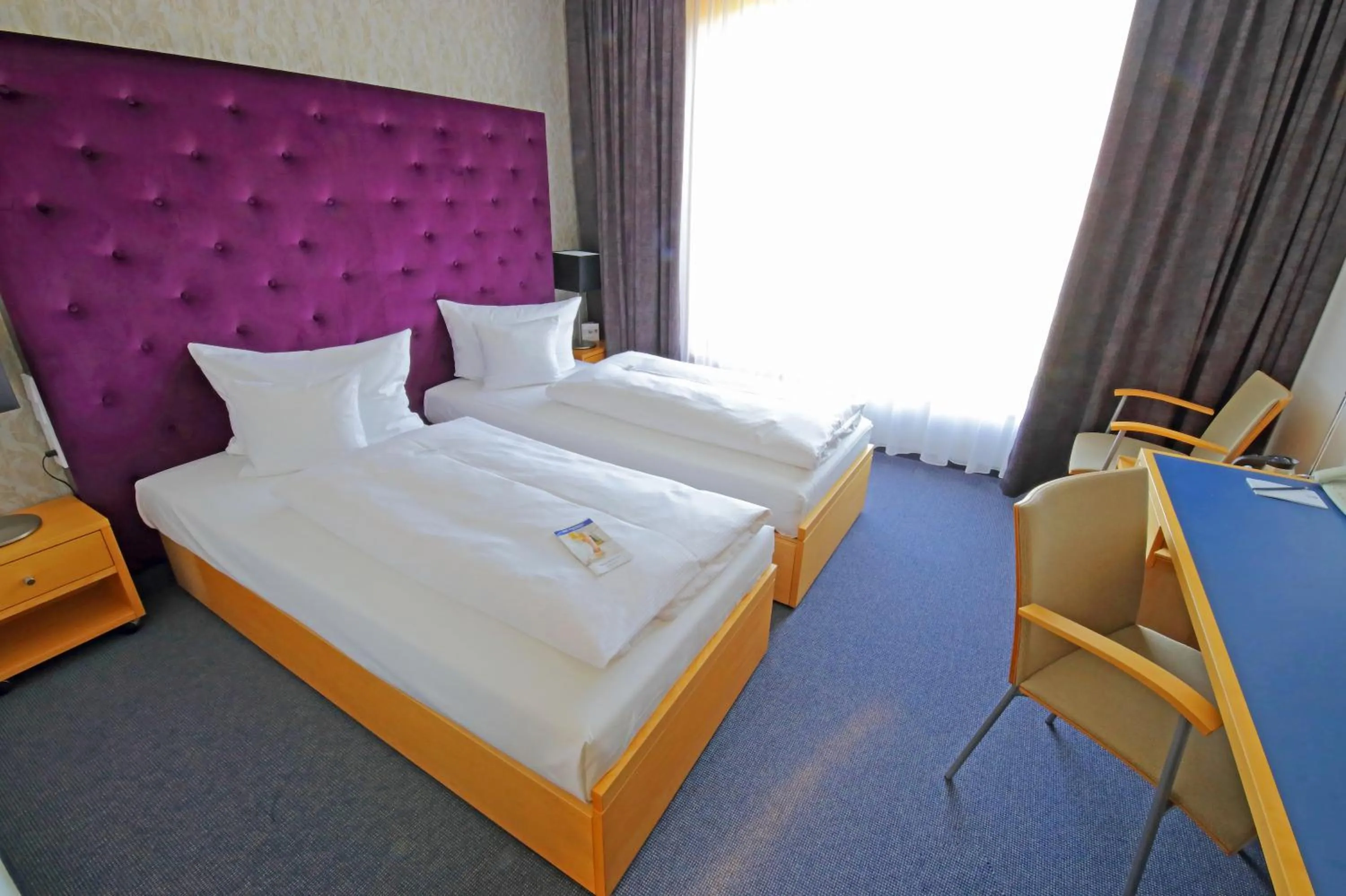 Photo of the whole room, Bed in rugs Hotel am Schlosspark Lichtenwalde