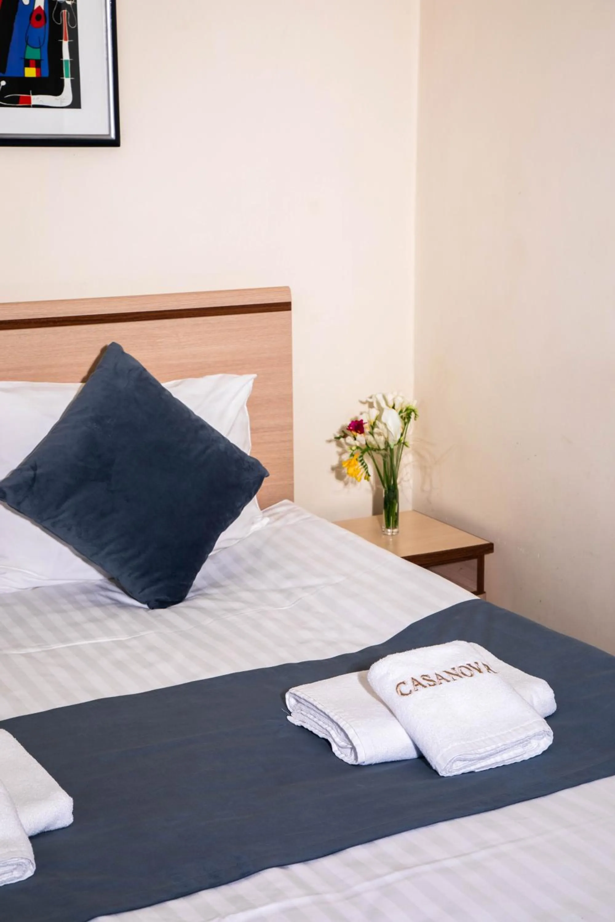 towels, Bed in Casanova Inn - Boutique Hotel
