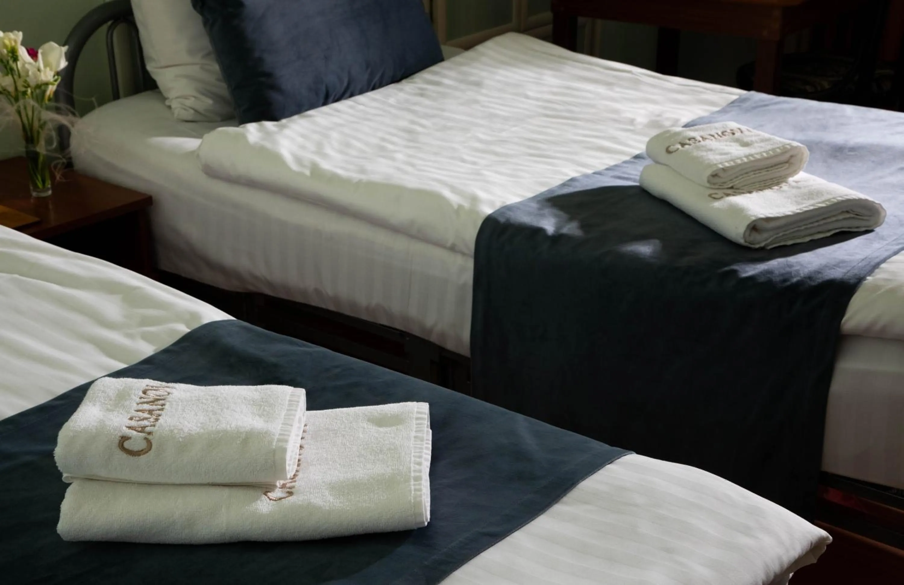 towels, Bed in Casanova Inn - Boutique Hotel