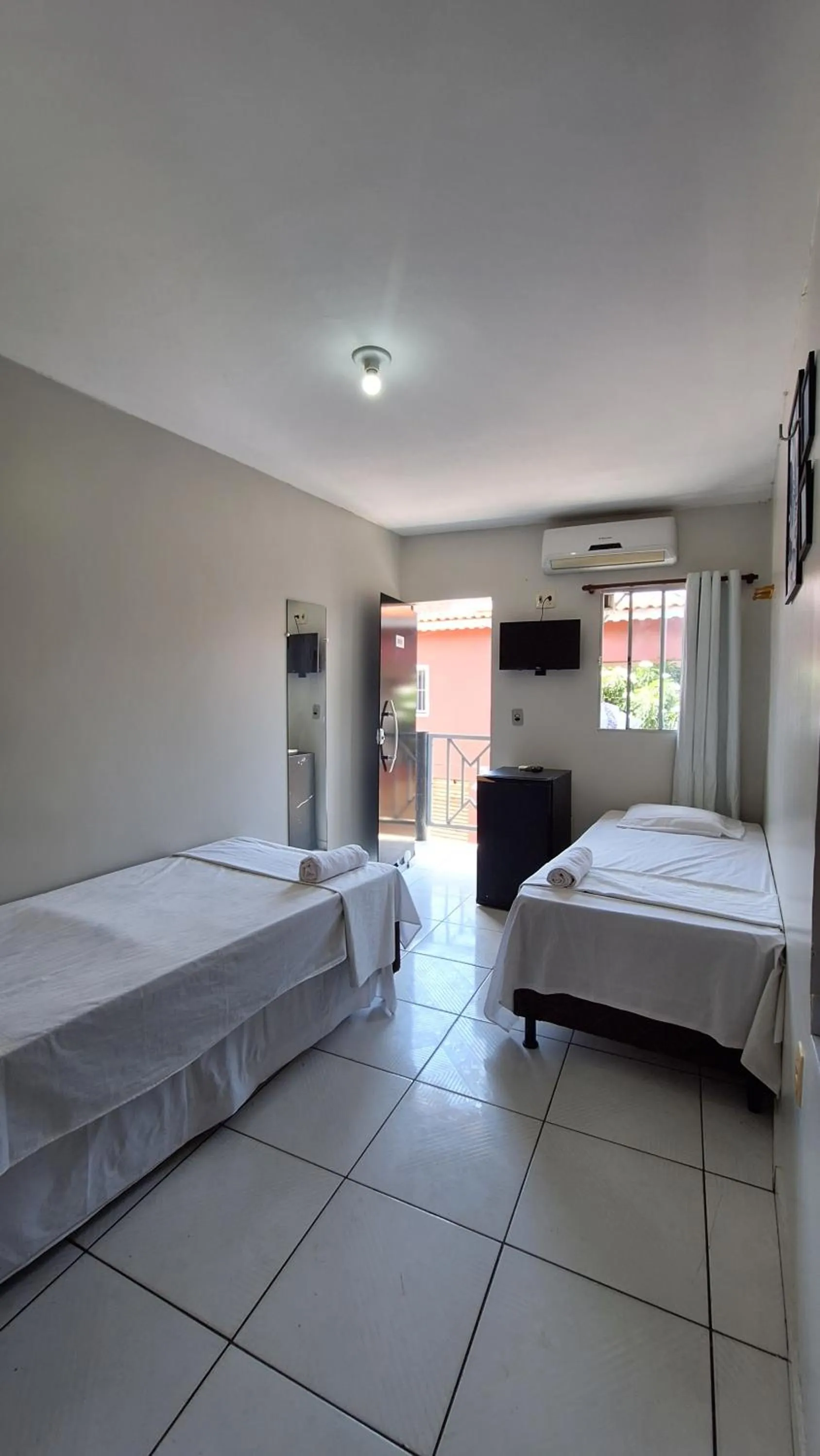 Bed in Canto da Duna Hotel