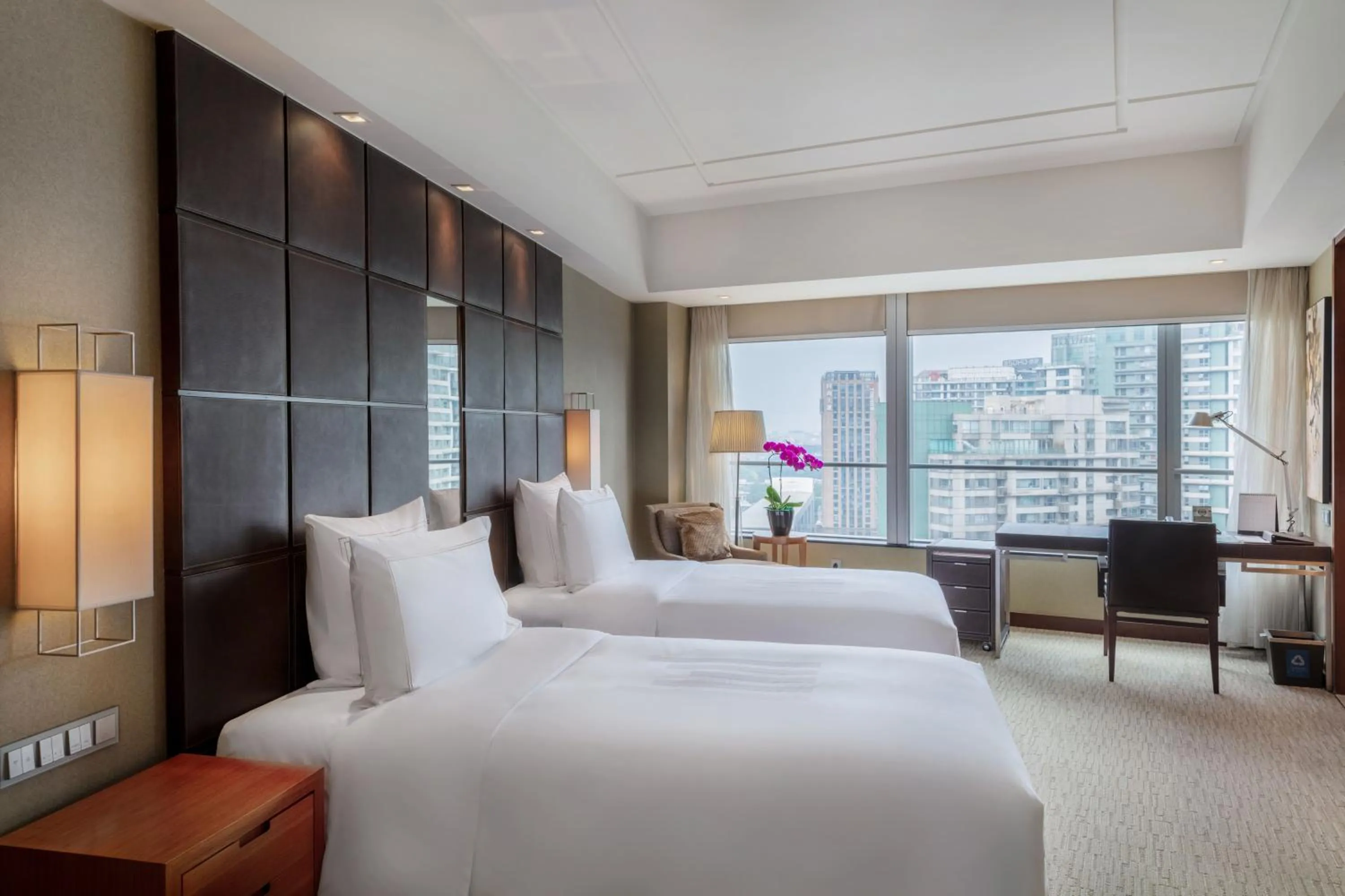 Bed in Grand Millennium Beijing