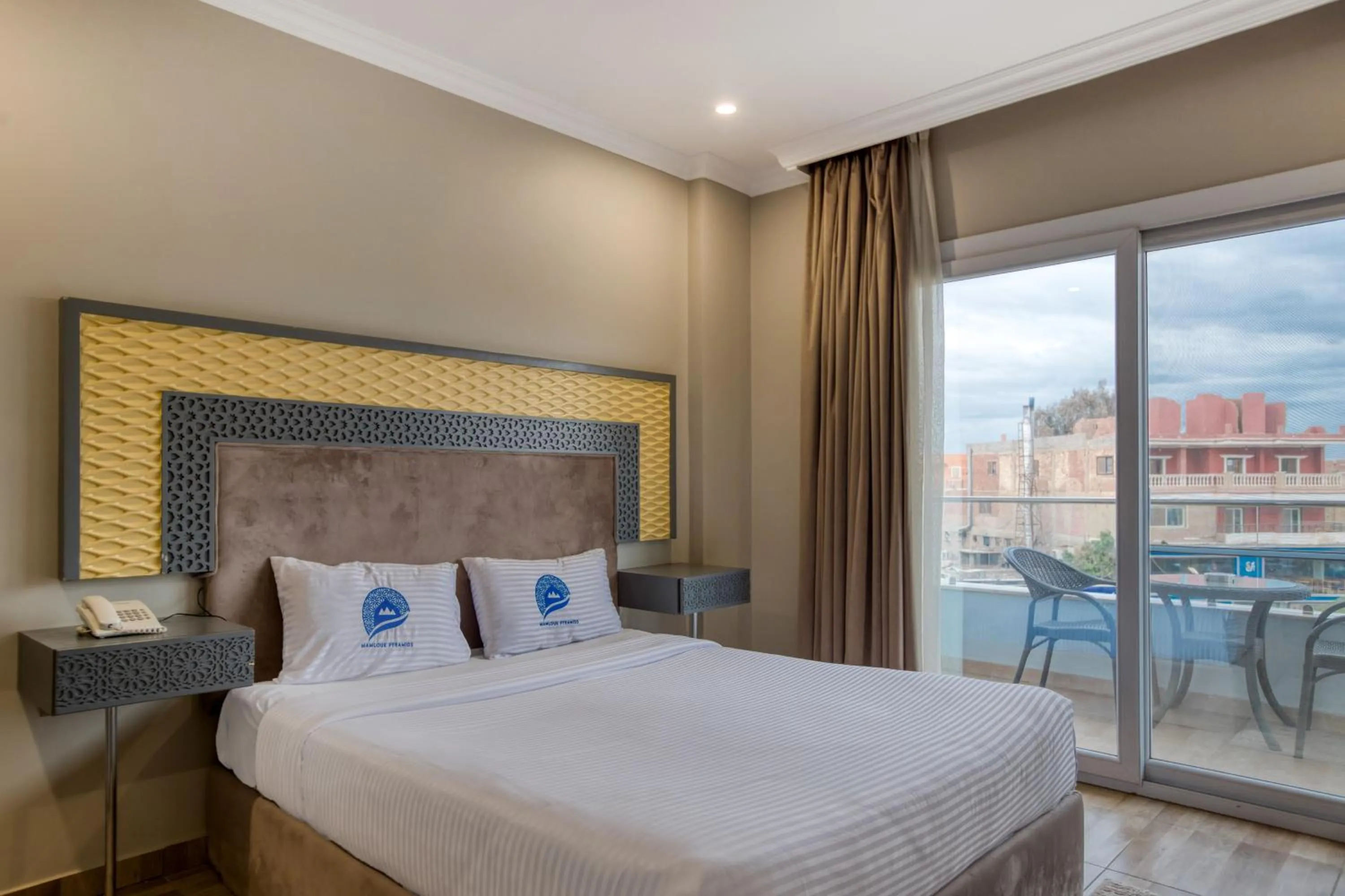 Bed in Mamlouk Pyramids Hotel