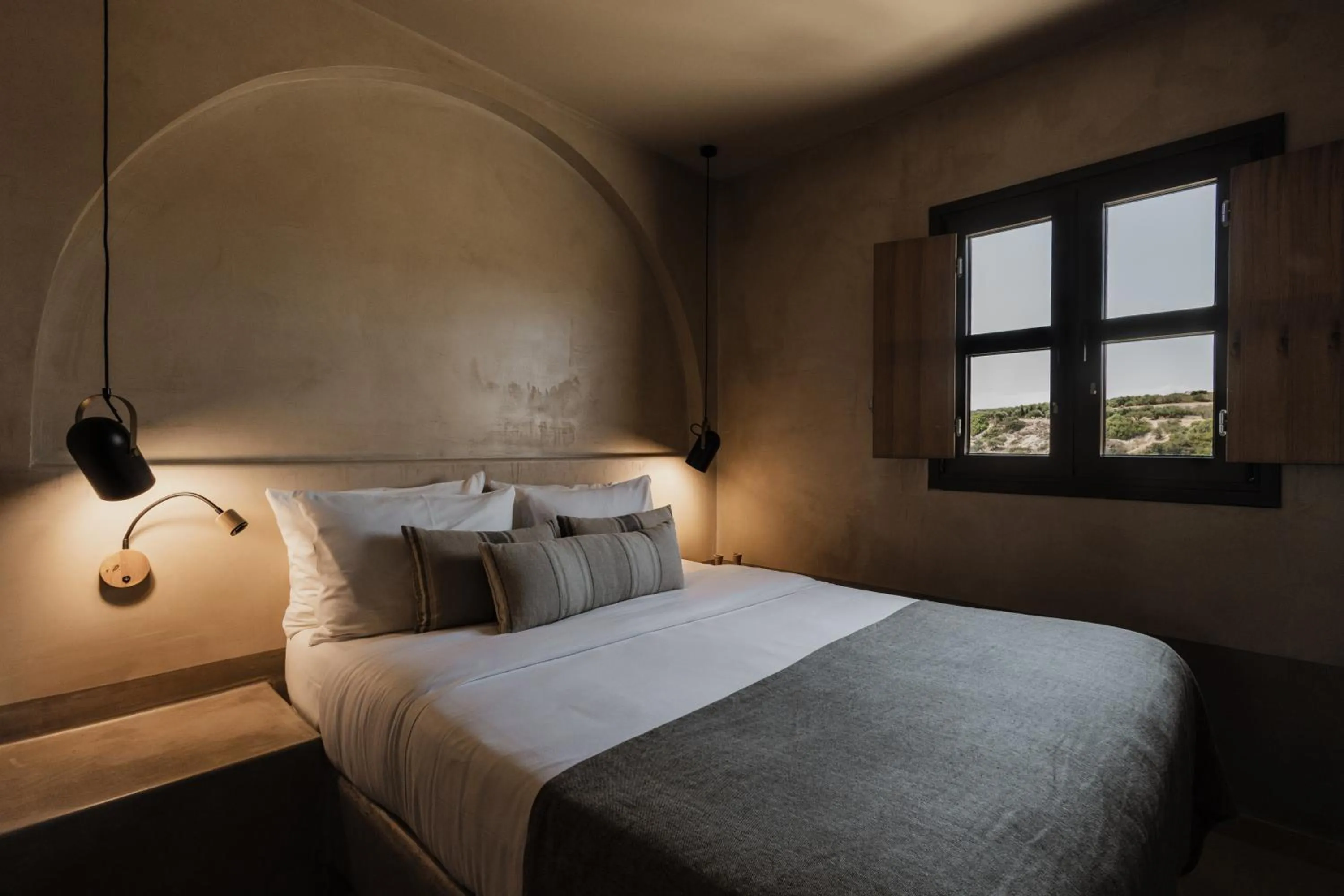 Bed in Momi Slow Living Hotel