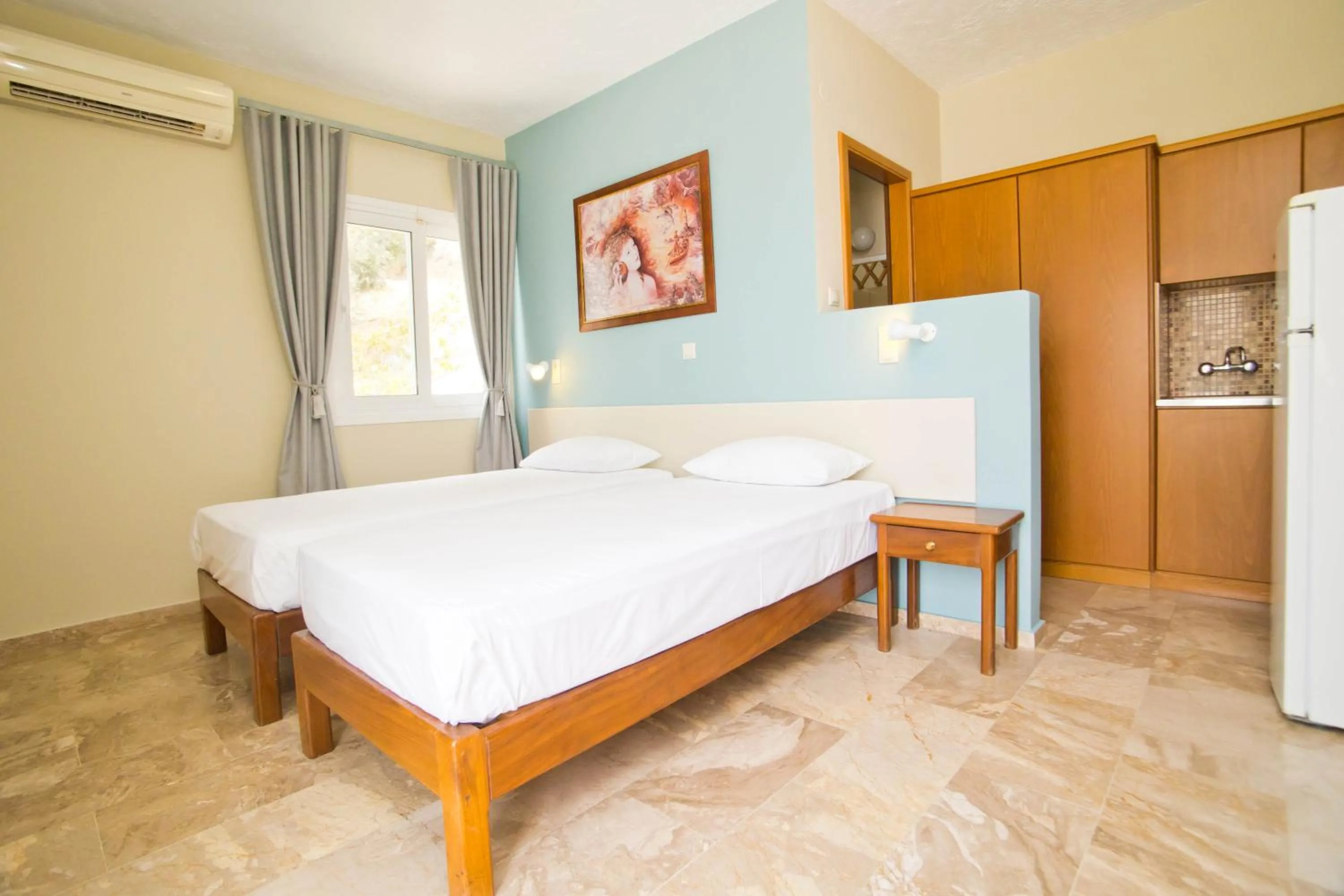 Bed in Acropolis Hotel