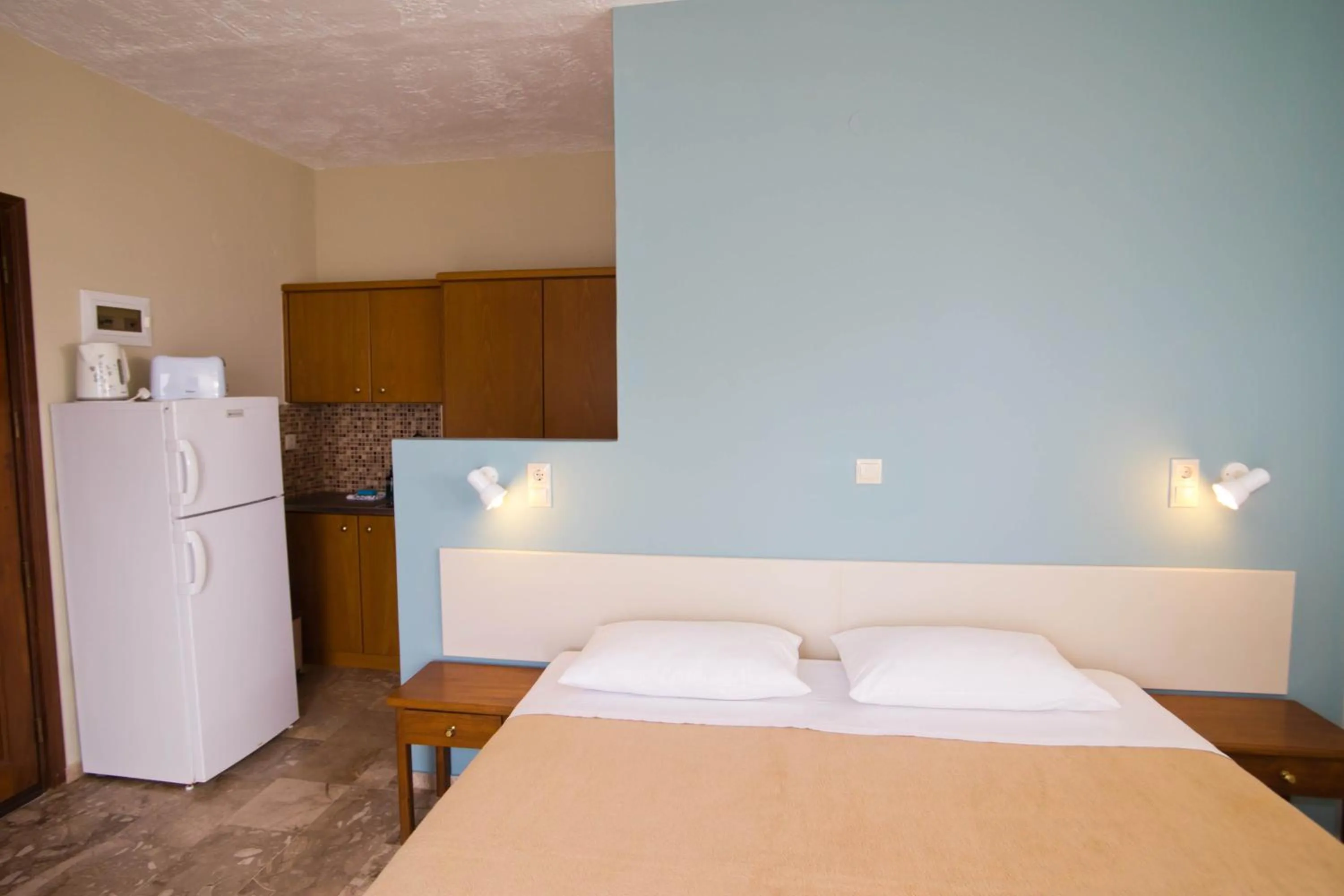 Bed in Acropolis Hotel