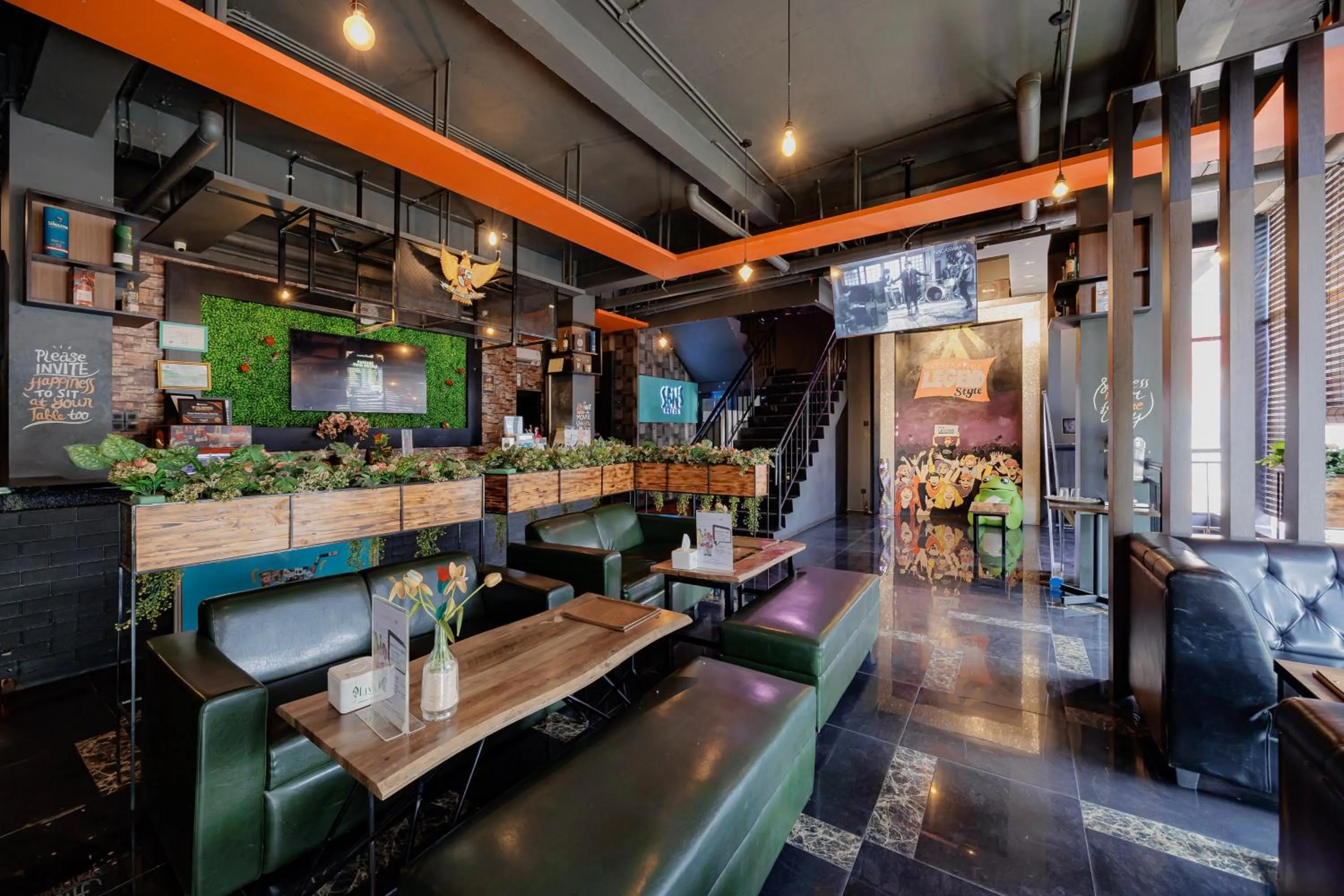 Seating area in Sans Hotel Roxy Jakarta