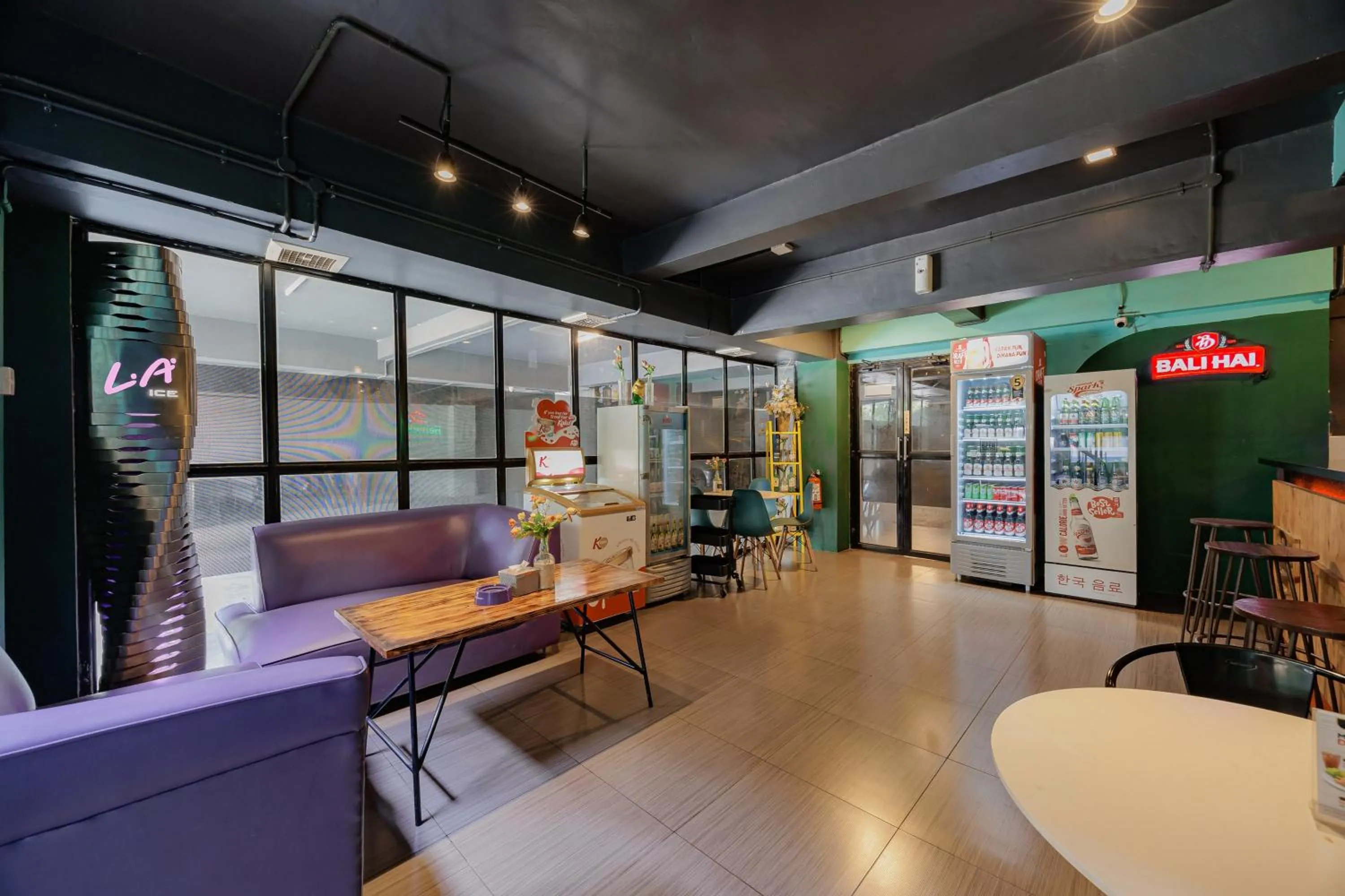 Seating area in Sans Hotel Roxy Jakarta