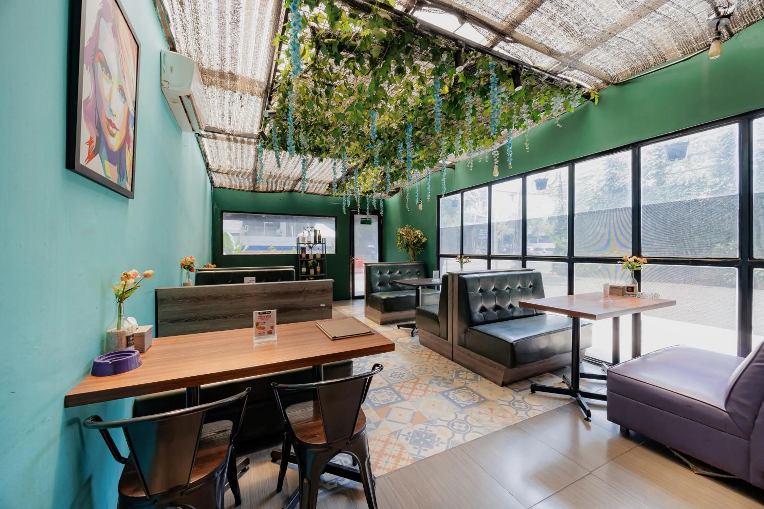 Seating area in Sans Hotel Roxy Jakarta