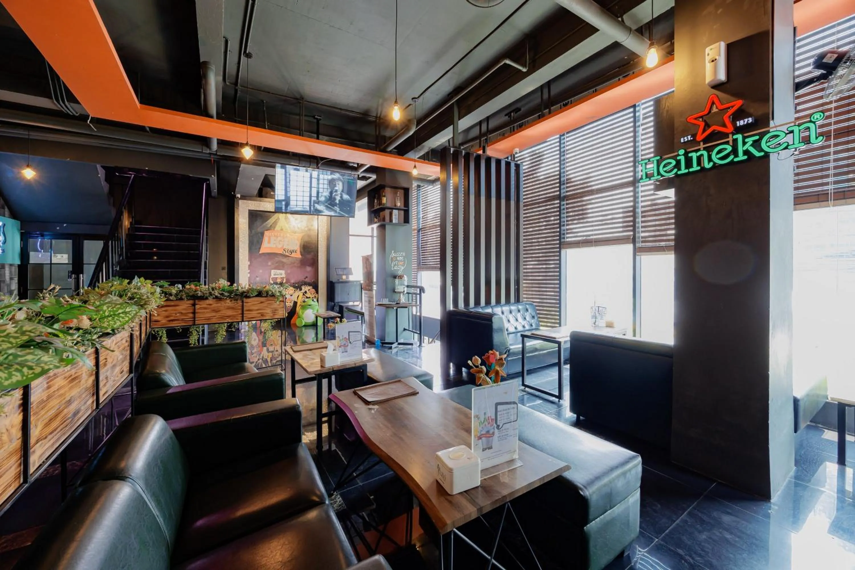 Seating area in Sans Hotel Roxy Jakarta