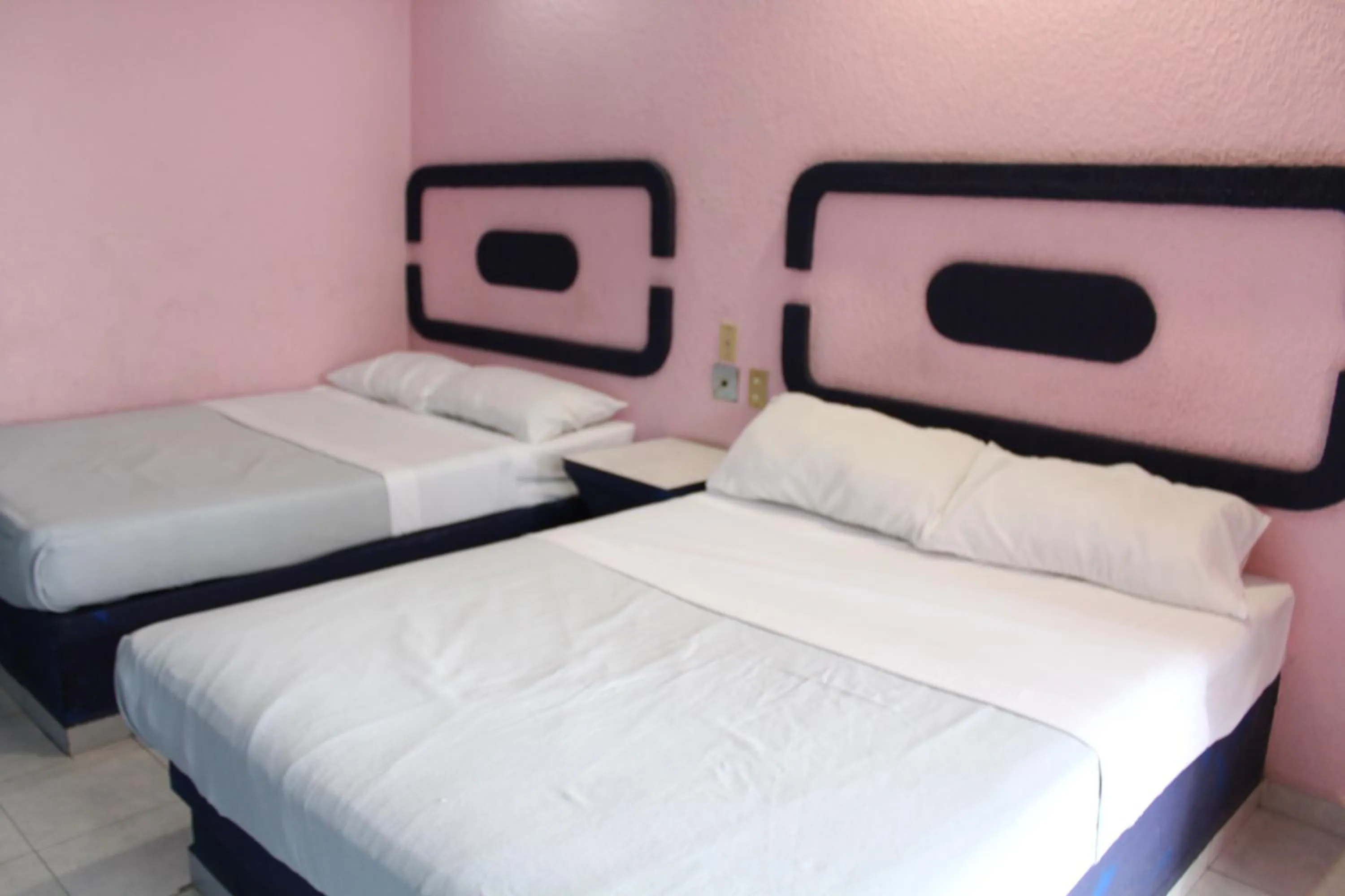 Bed in Posada San José, Hotel