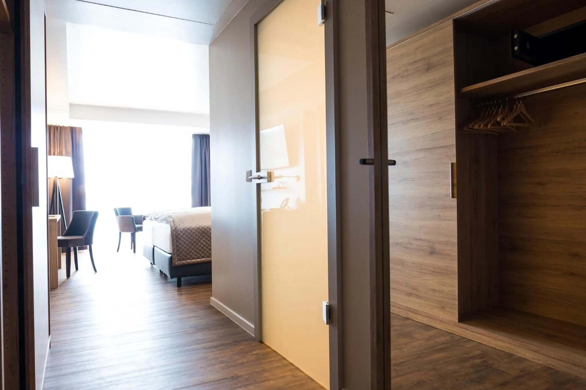 Photo of the whole room, Bed in Rebhan's Business und Wellness Hotel