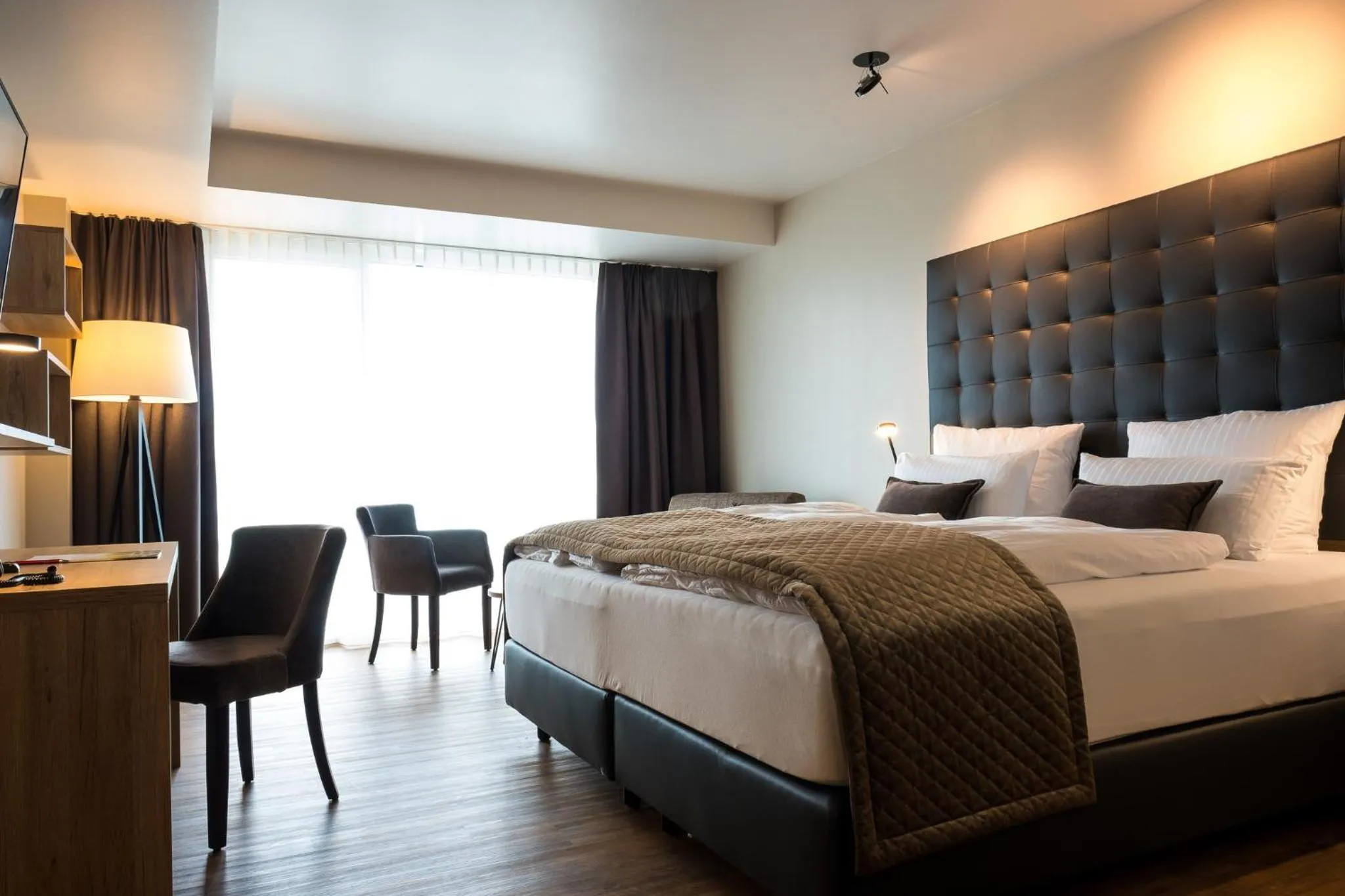 Bed in Rebhan's Business und Wellness Hotel