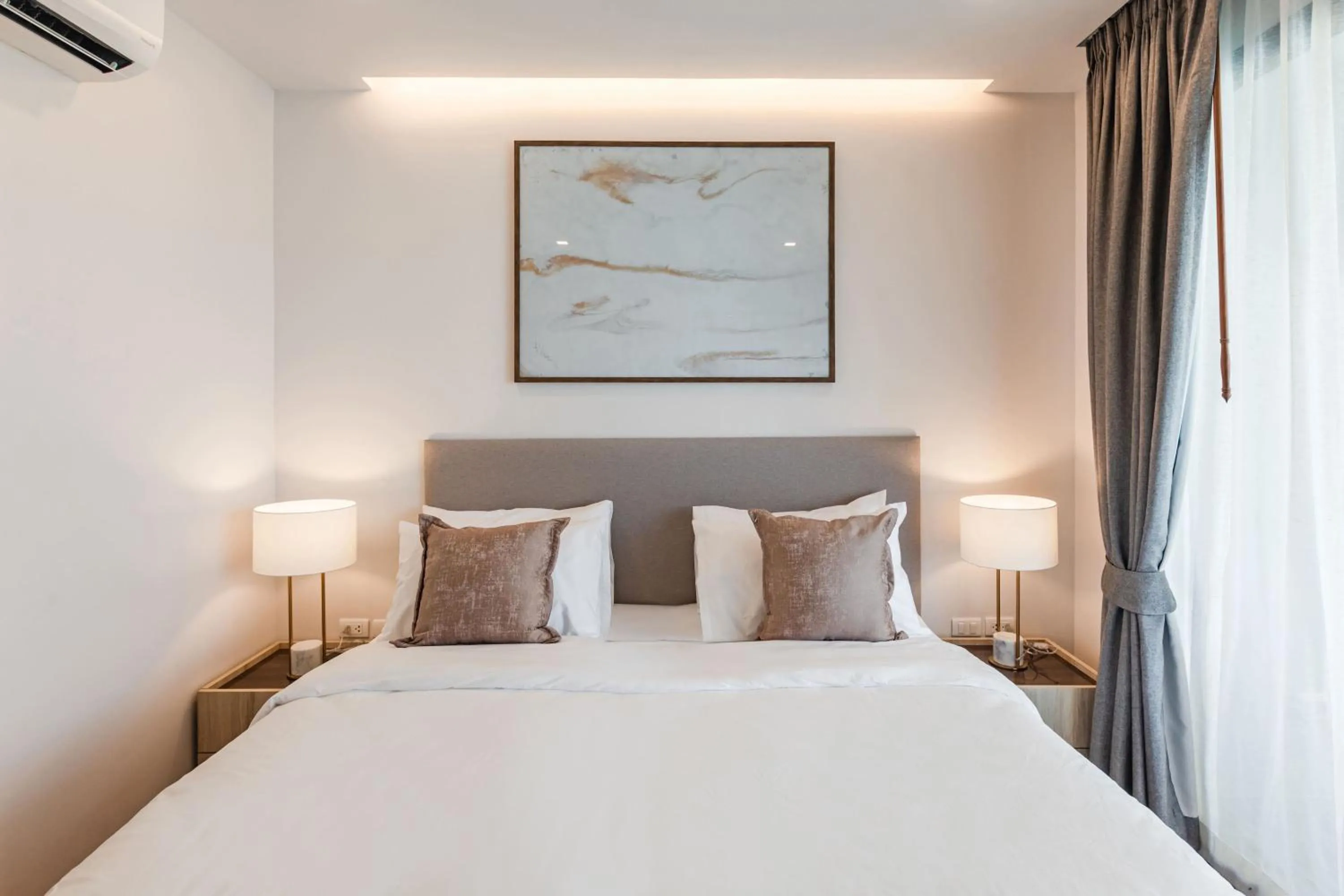 Bed in The Proud Rawai Resort