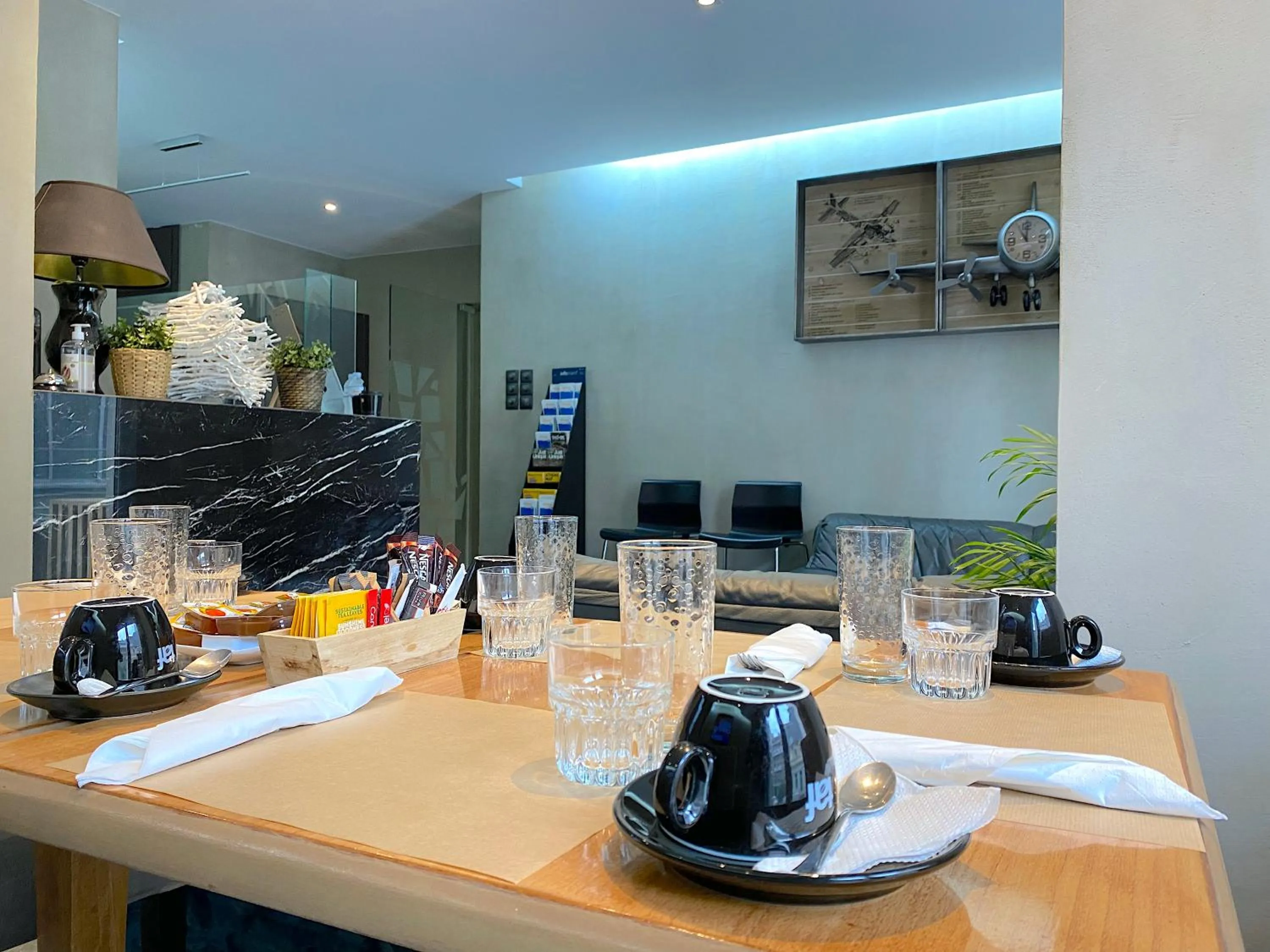 Communal lounge/ TV room in Athens Warehouse Boutique Hotel & Suites