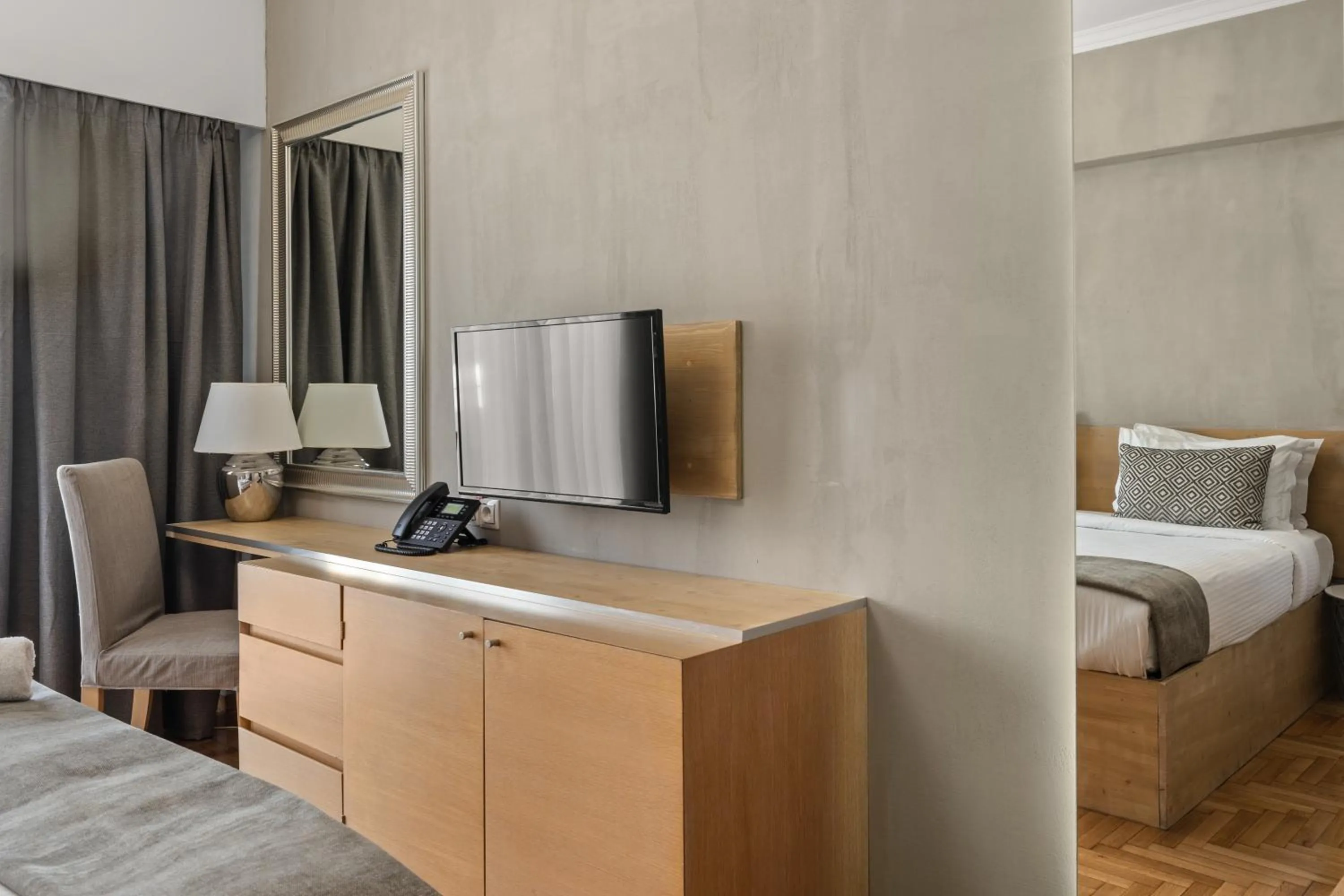 TV and multimedia in Athens Warehouse Boutique Hotel & Suites