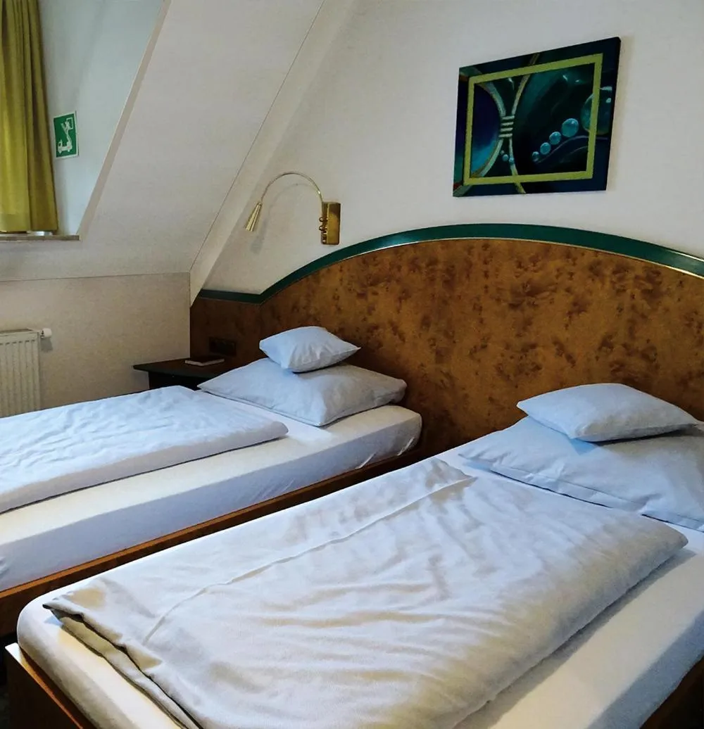 Photo of the whole room, Bed in Hotel Eberbacher Hof