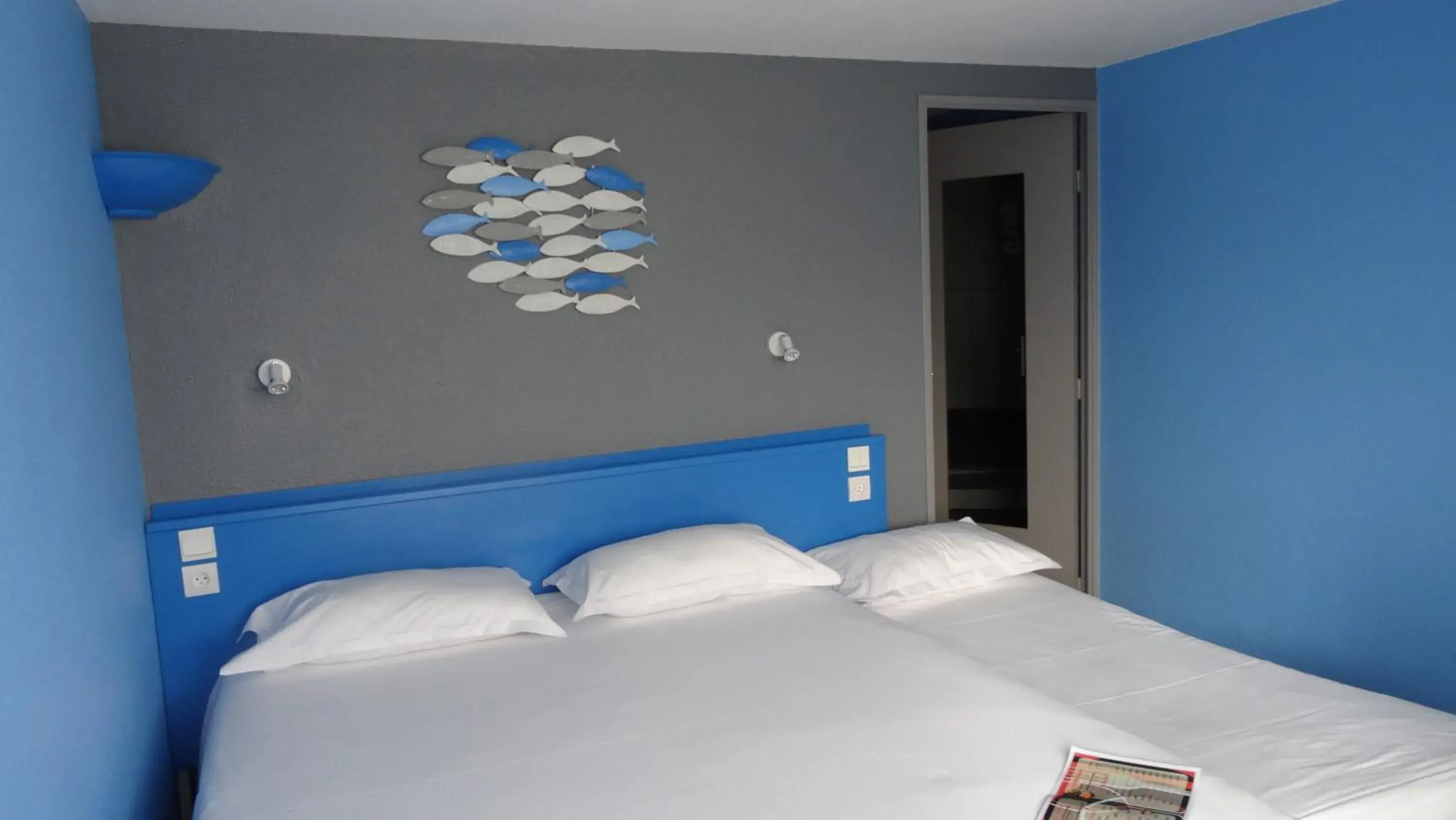 Triple Room (1 double bed and 1 single bed) in Initial by balladins Dieppe Triple Room (1 double bed and 1 single bed) in Initial by balladins Dieppe