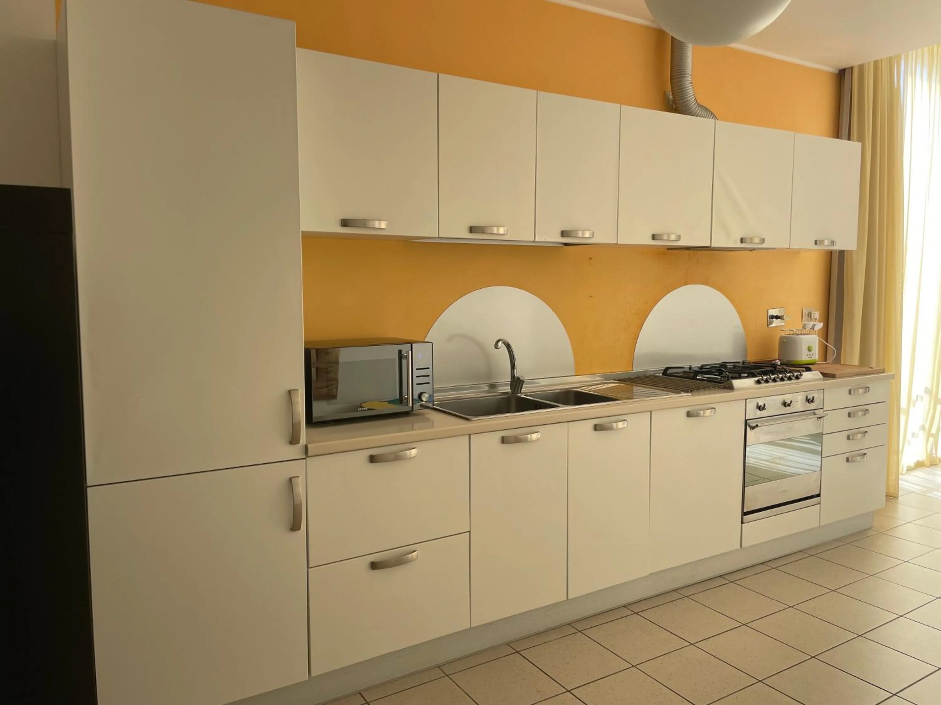 Kitchen or kitchenette in Solidago Residence