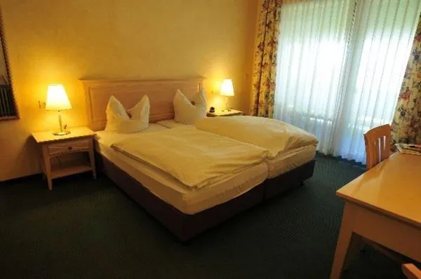 Photo of the whole room, Bed in Hotel Tannenhof