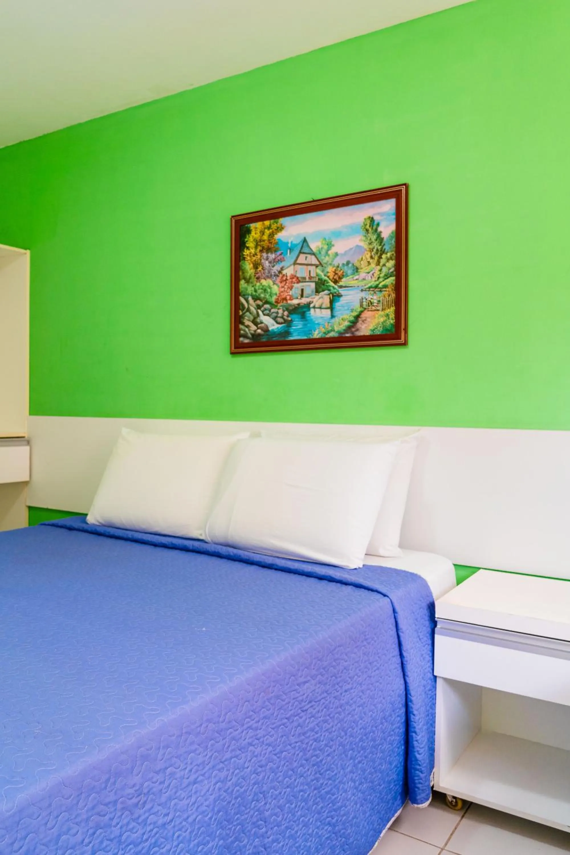 Bed in Pousada Ouriço