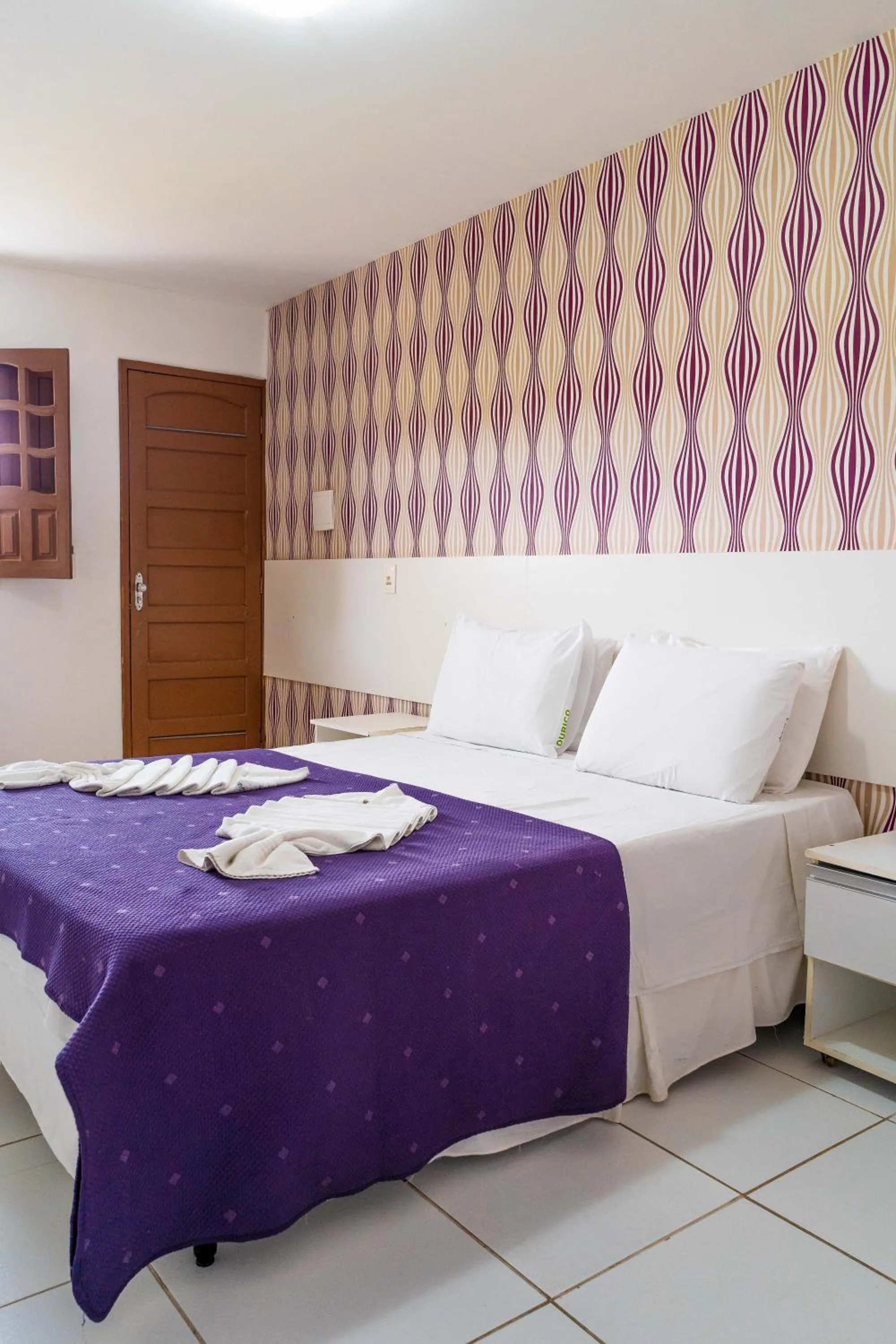 Bed in Pousada Ouriço