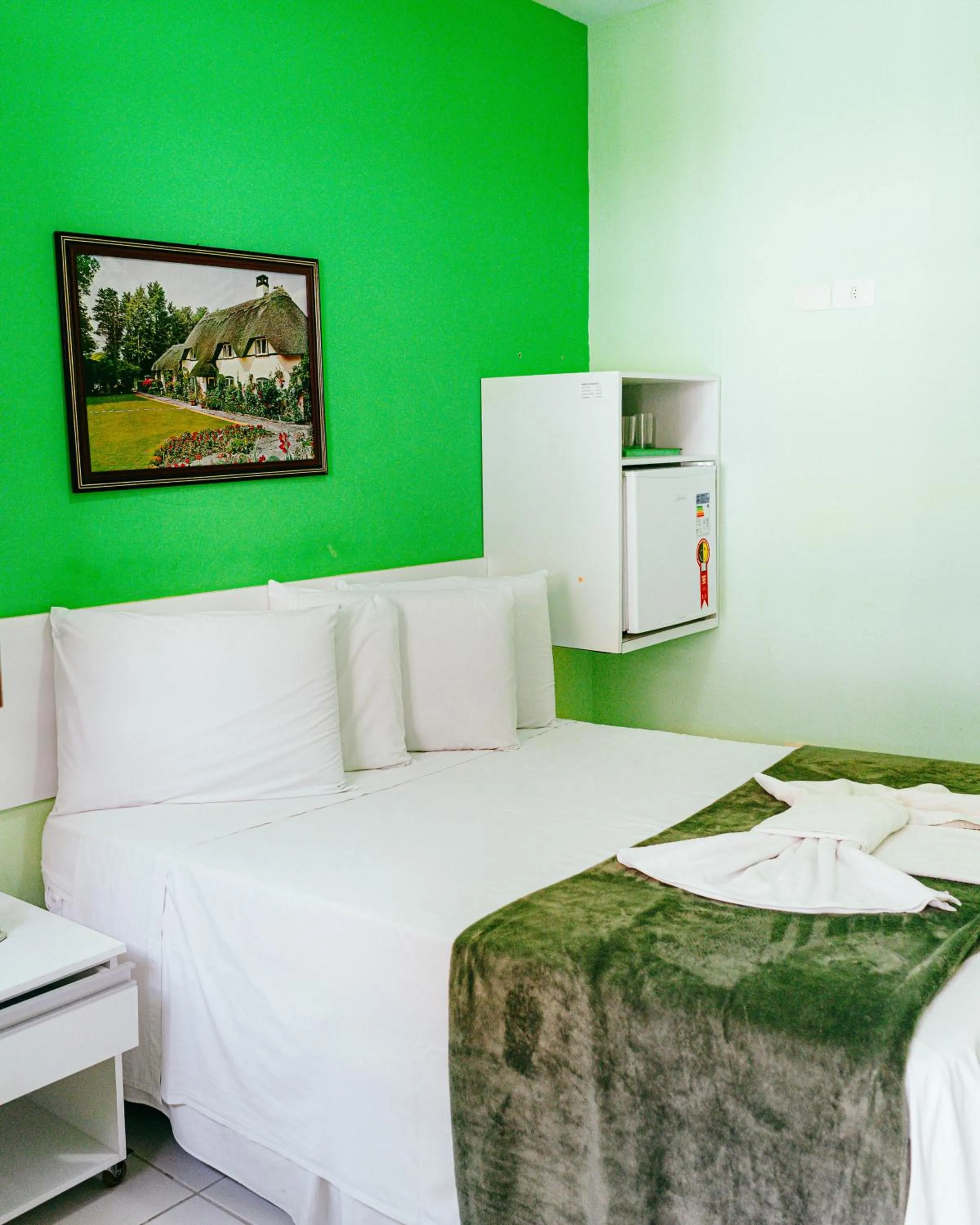 Bed in Pousada Ouriço