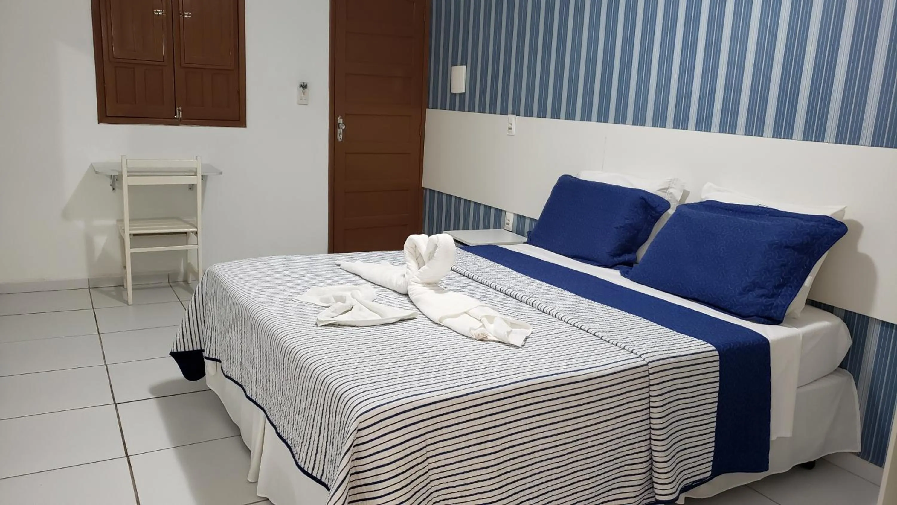 Bed in Pousada Ouriço