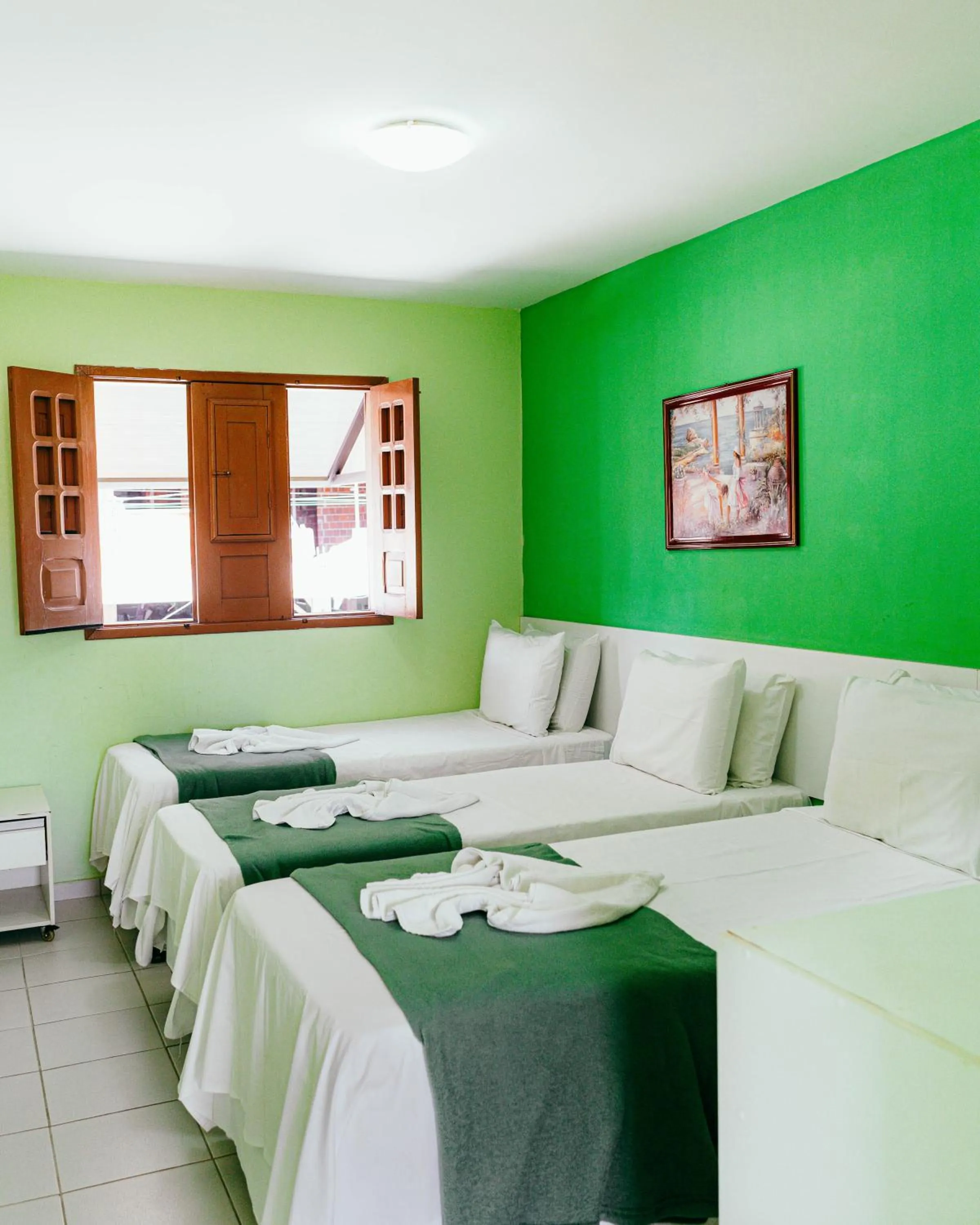 Bed in Pousada Ouriço