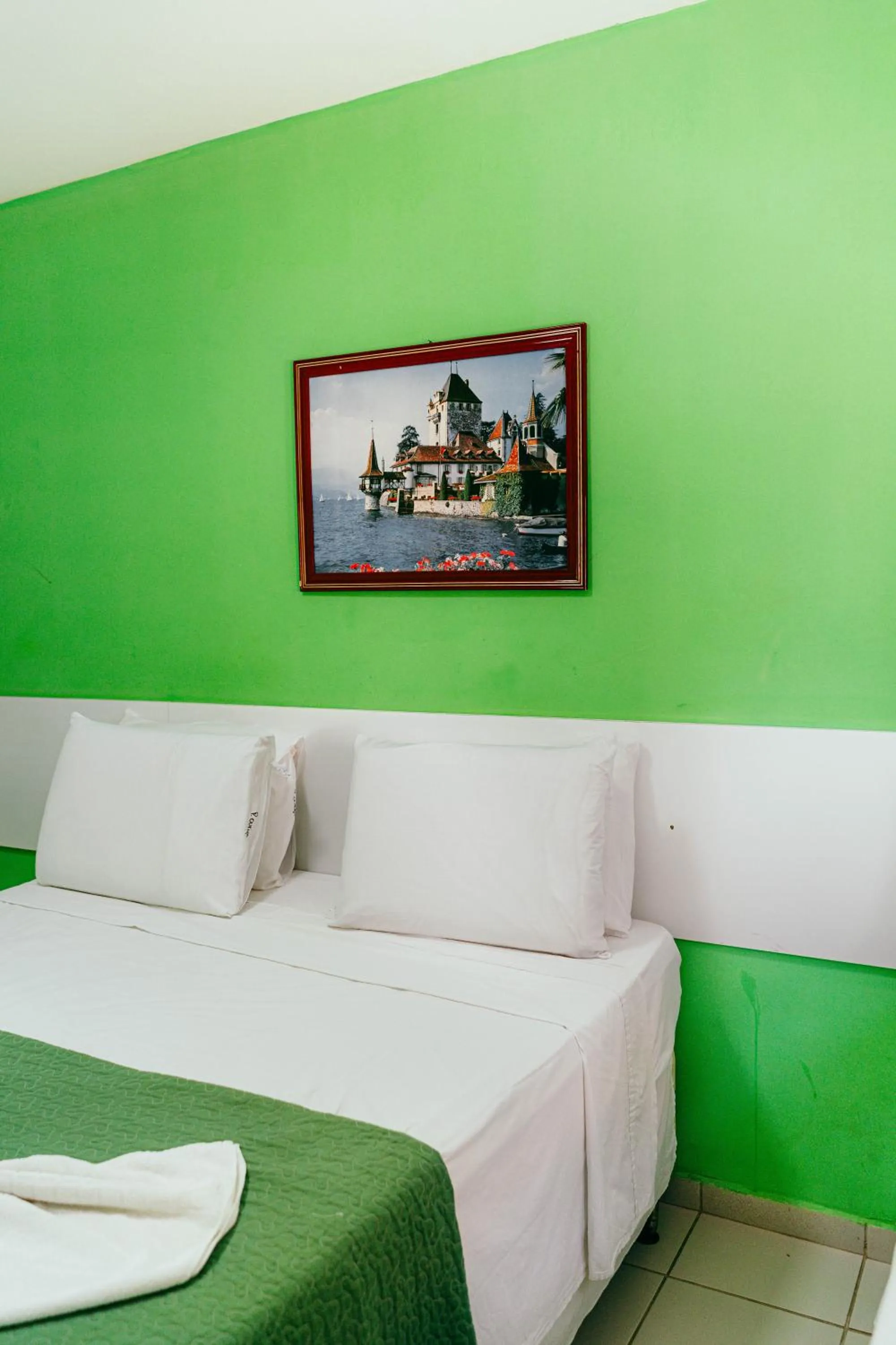 Bed in Pousada Ouriço