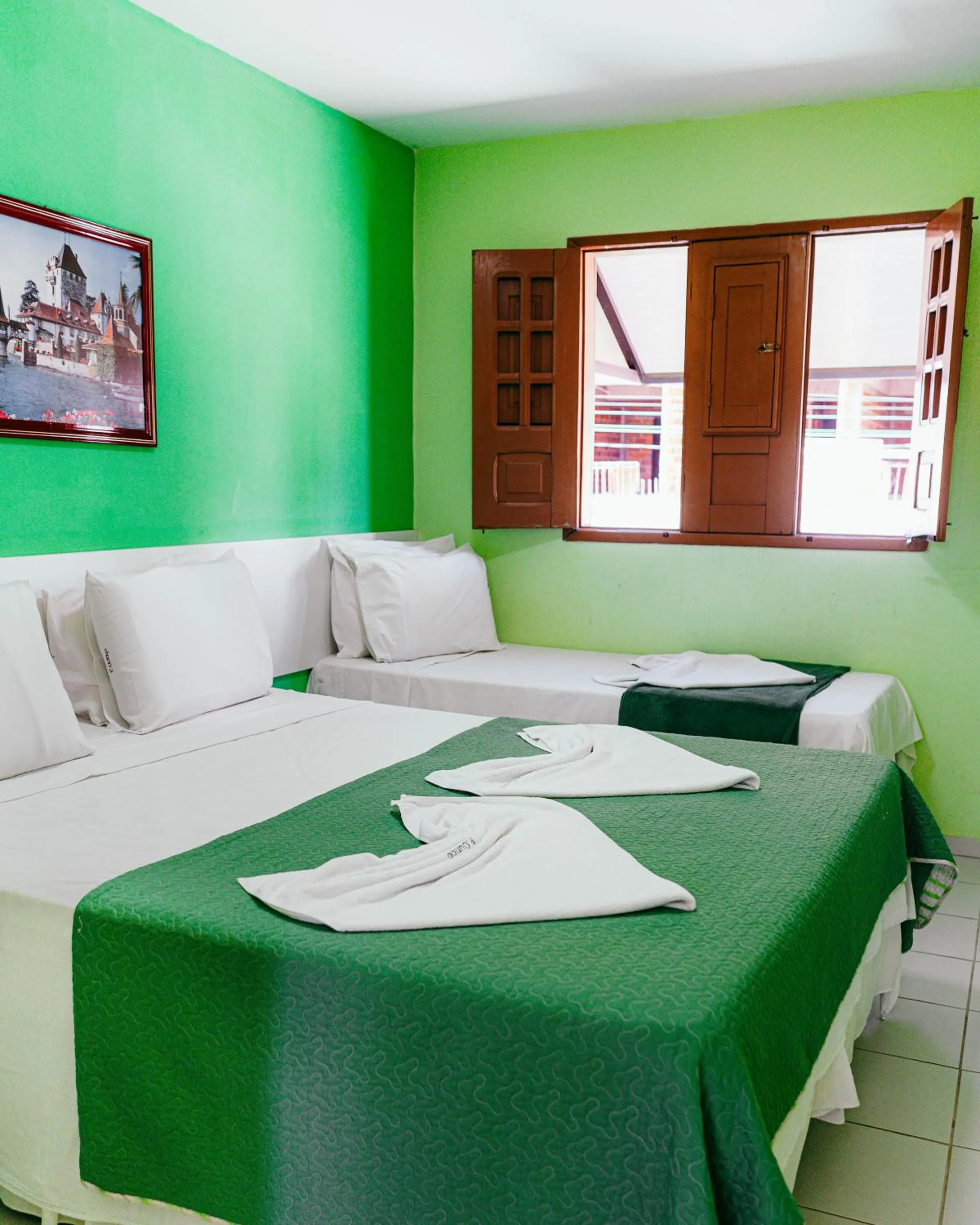 Bed in Pousada Ouriço