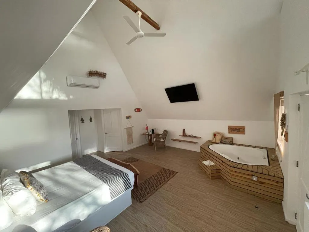 Bed in Punta Rucia Lodge Hotel Boutique & Spa