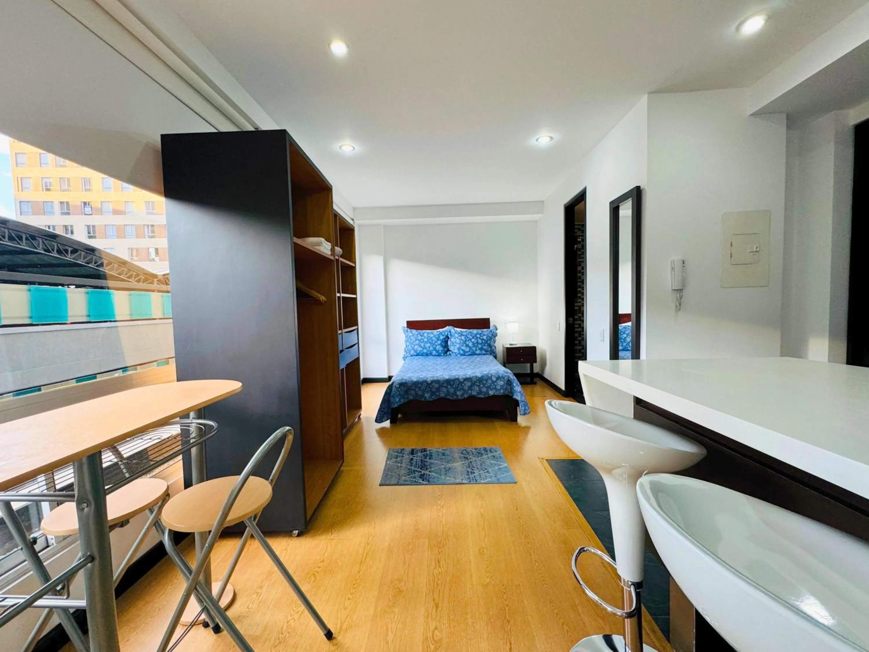 Bed in Aparta Suite Continental Bogotá