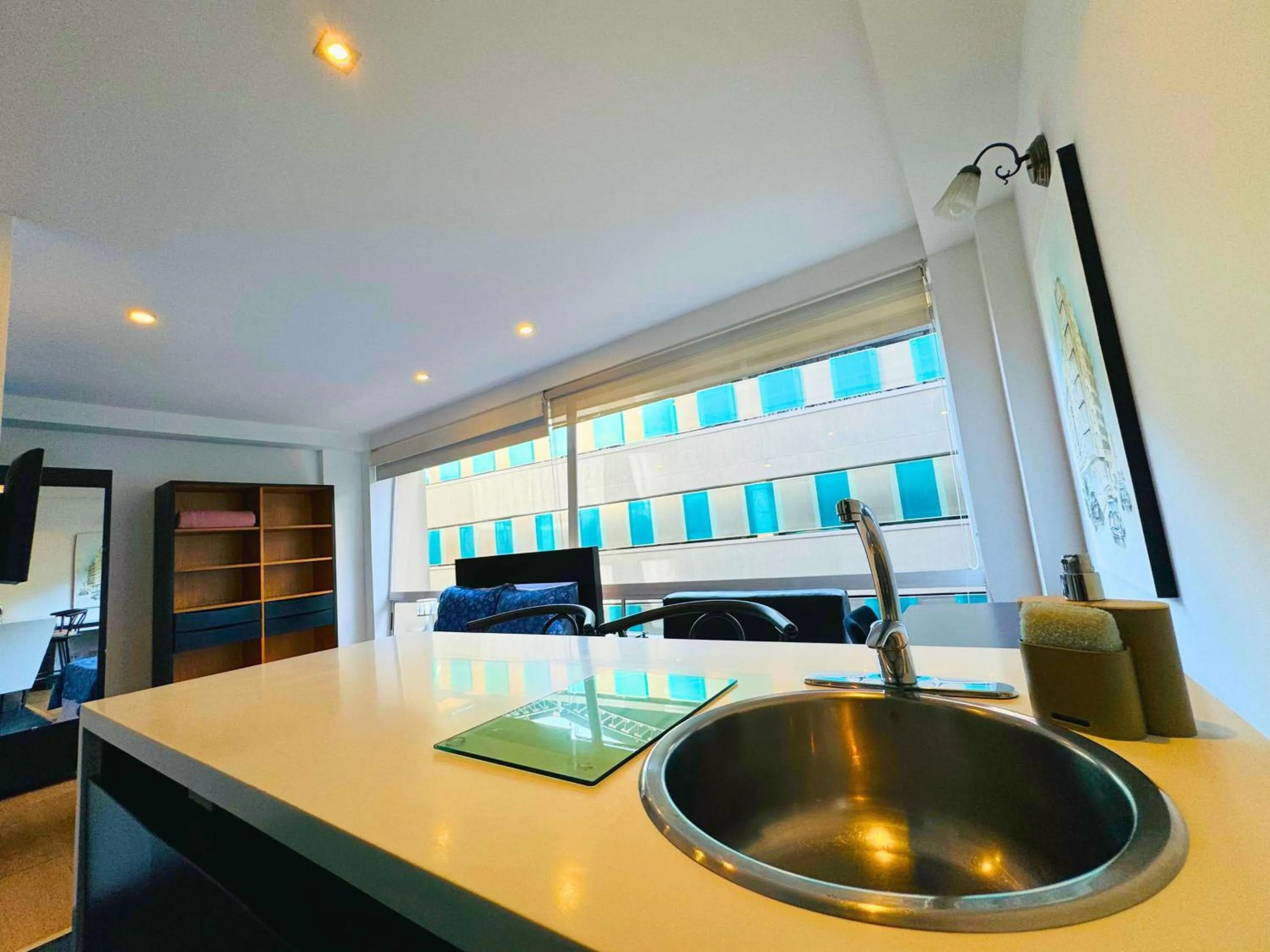 Kitchen or kitchenette in Aparta Suite Continental Bogotá