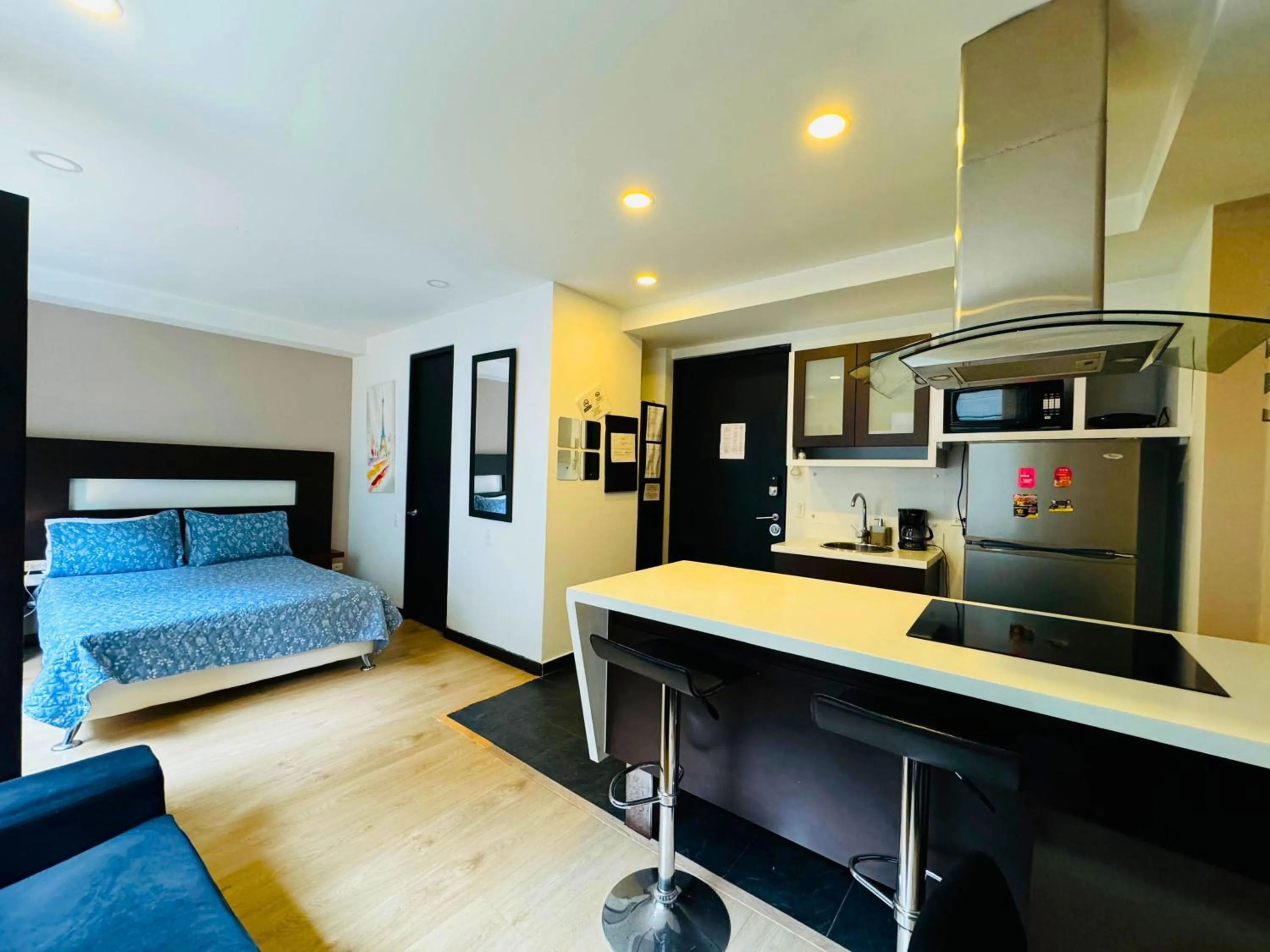 Kitchen or kitchenette, Bed in Aparta Suite Continental Bogotá