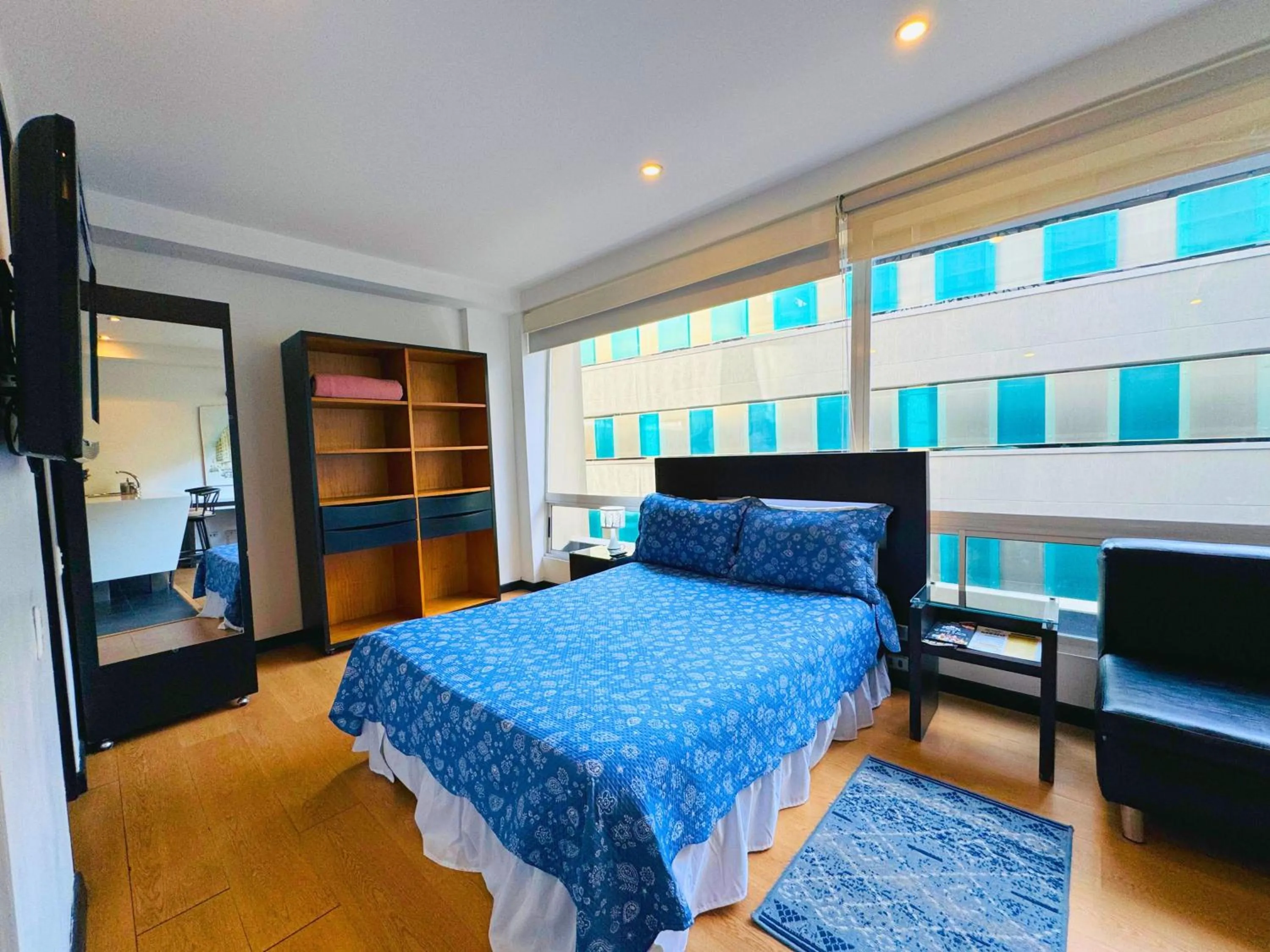 Photo of the whole room, Bed in Aparta Suite Continental Bogotá