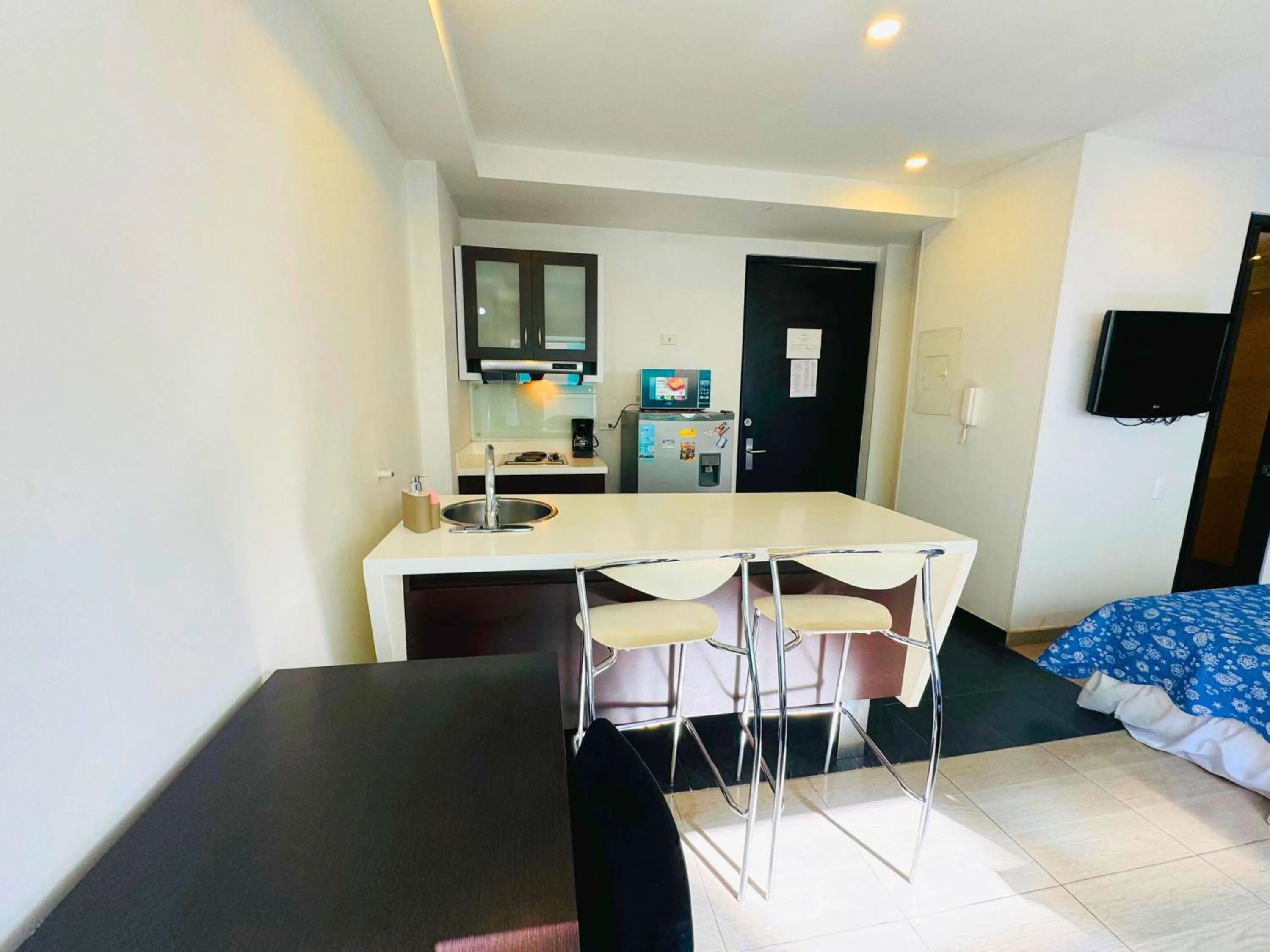 Kitchen or kitchenette in Aparta Suite Continental Bogotá