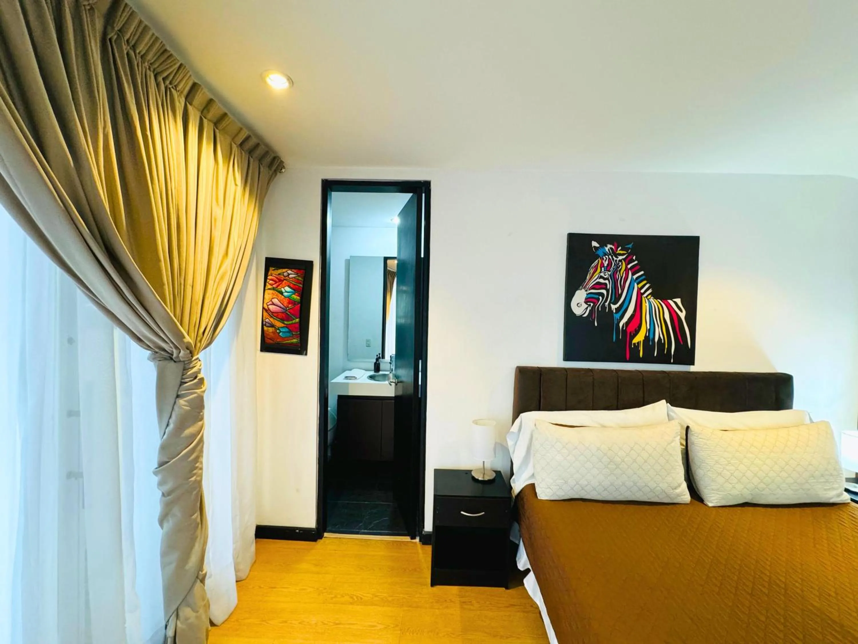 Bed in Aparta Suite Continental Bogotá