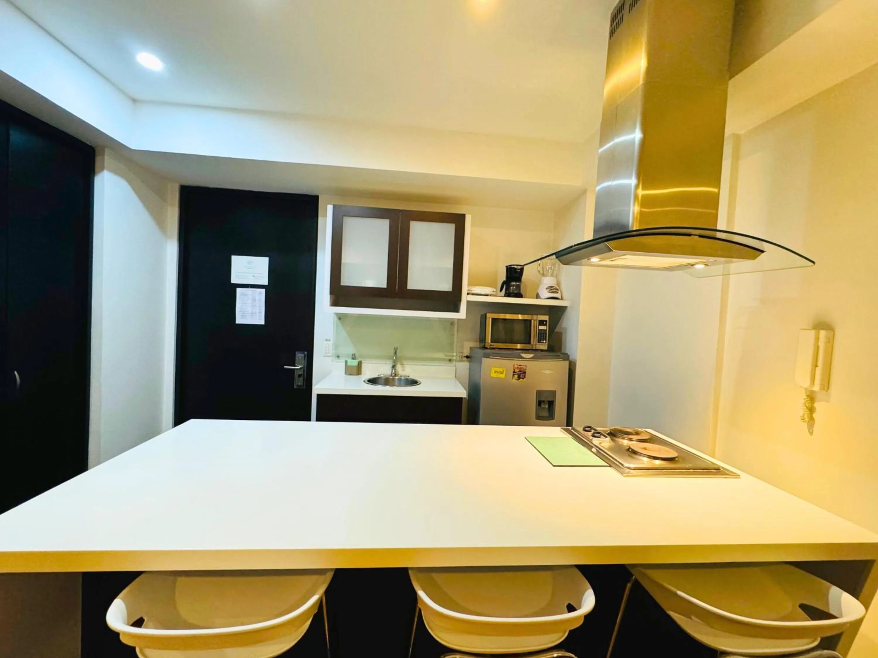 Kitchen or kitchenette in Aparta Suite Continental Bogotá