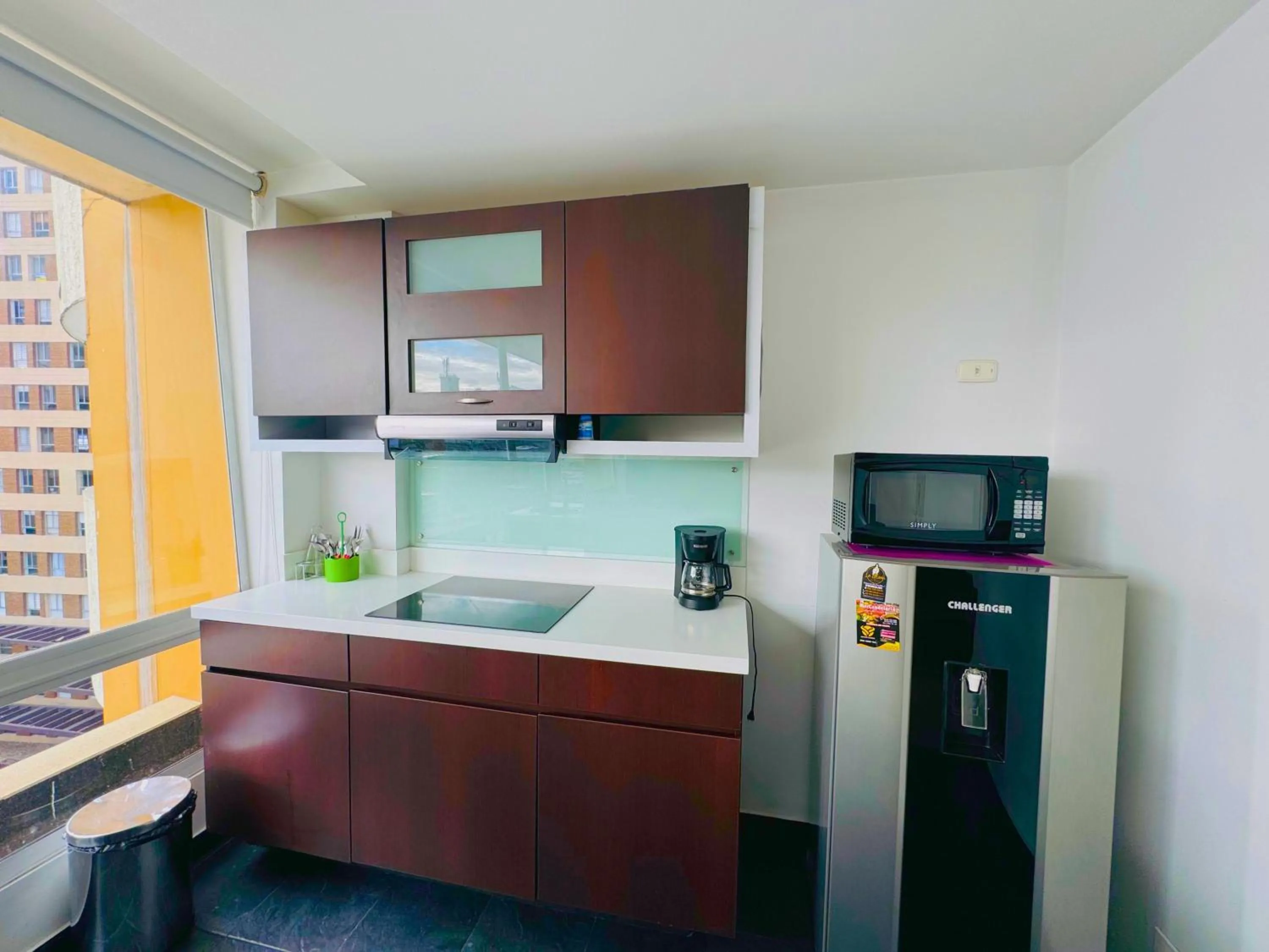 Kitchen or kitchenette in Aparta Suite Continental Bogotá