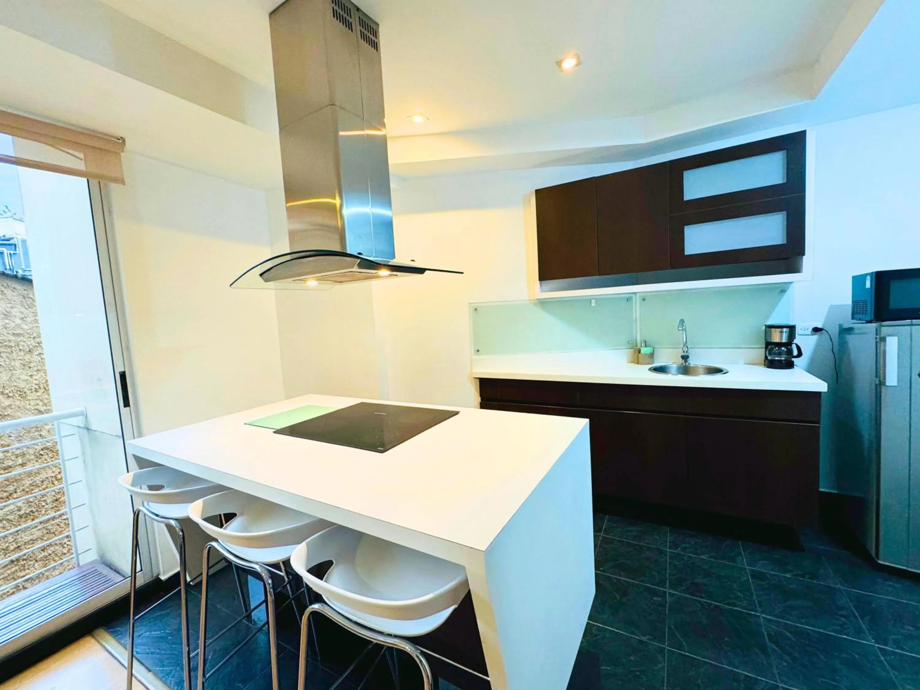 Kitchen or kitchenette in Aparta Suite Continental Bogotá