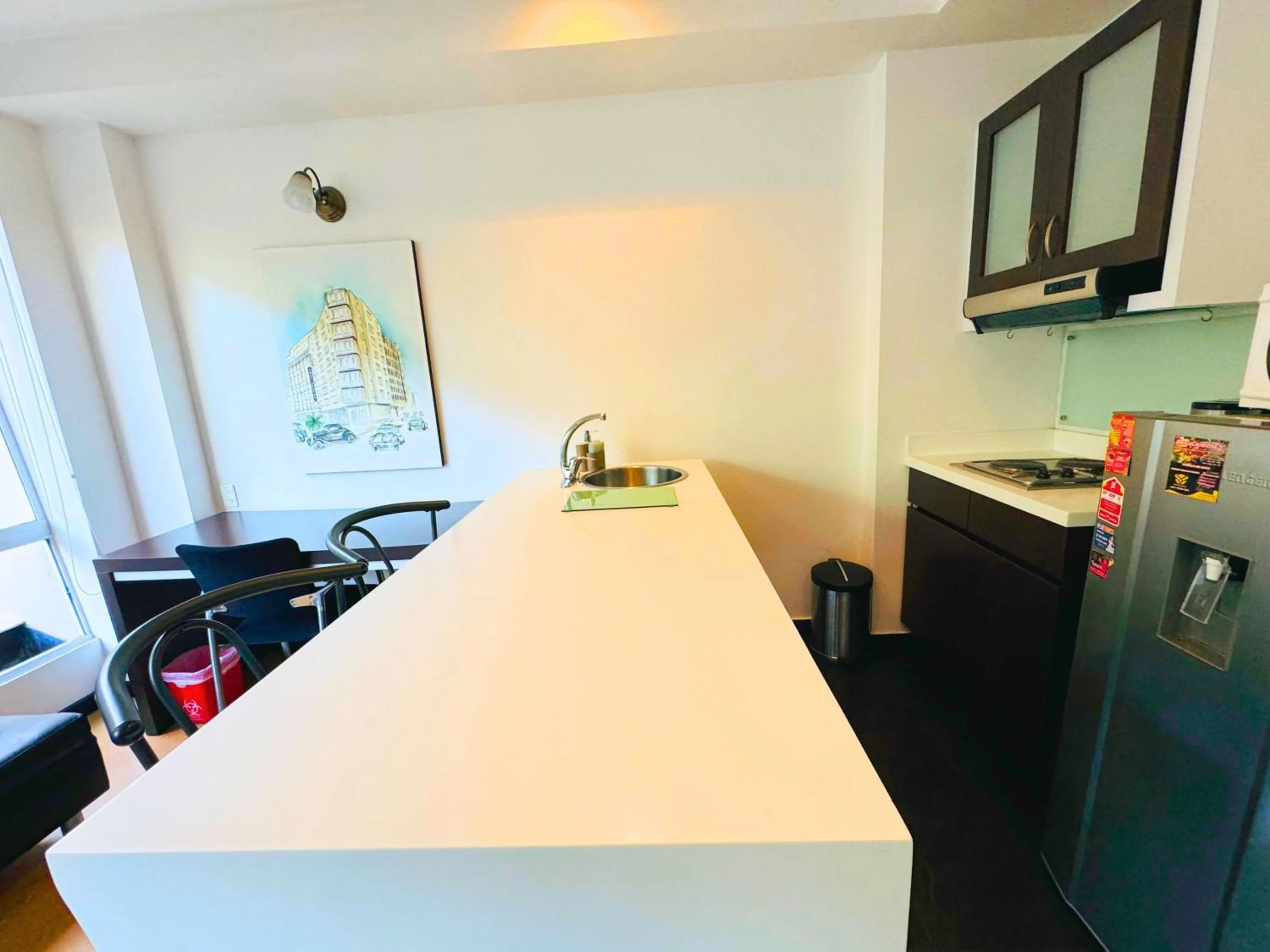 Kitchen or kitchenette in Aparta Suite Continental Bogotá