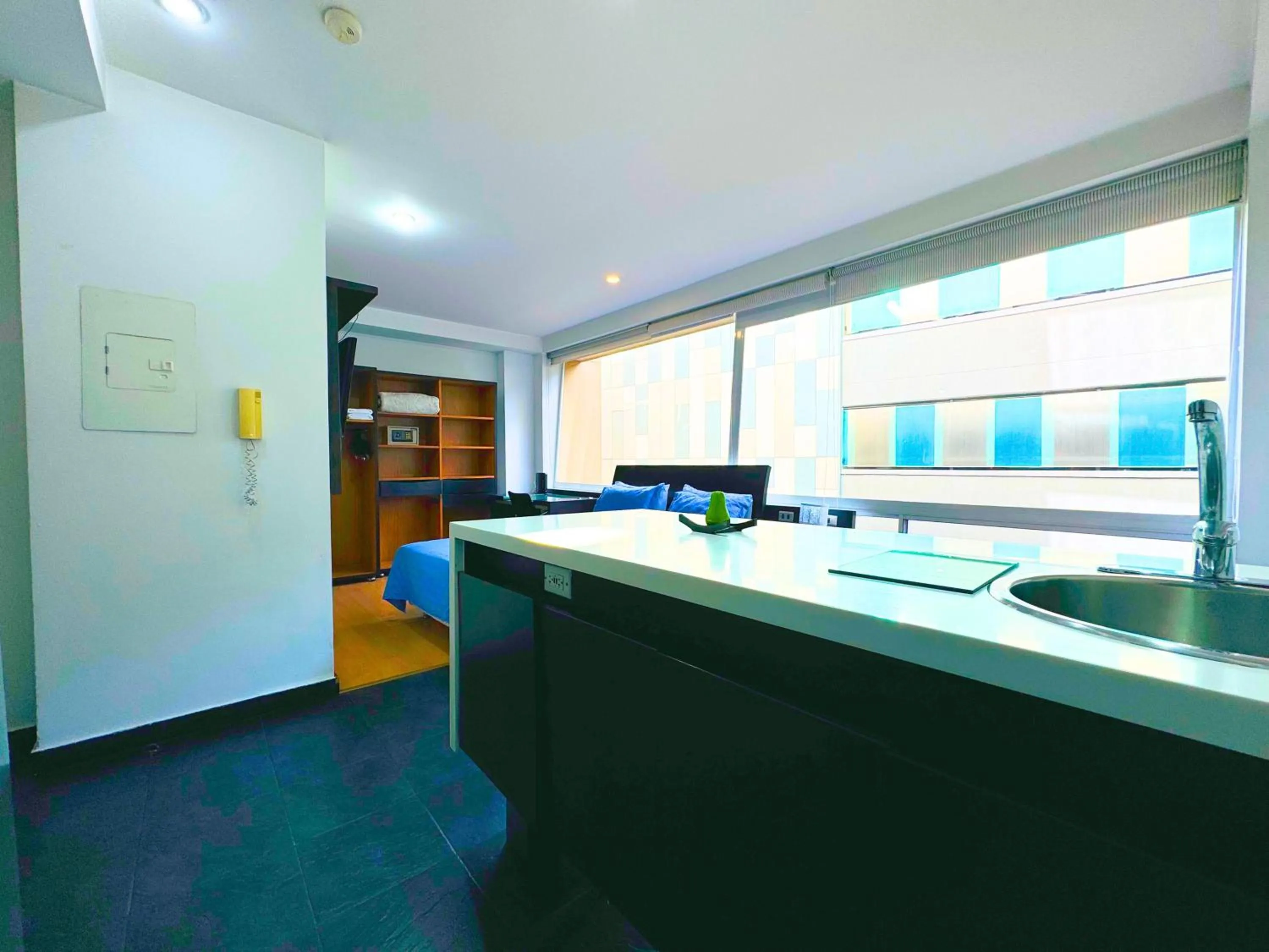 Kitchen or kitchenette in Aparta Suite Continental Bogotá