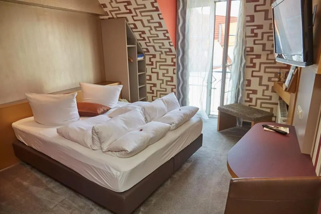 Bed in Flair Hotel Zum Schwarzen Reiter