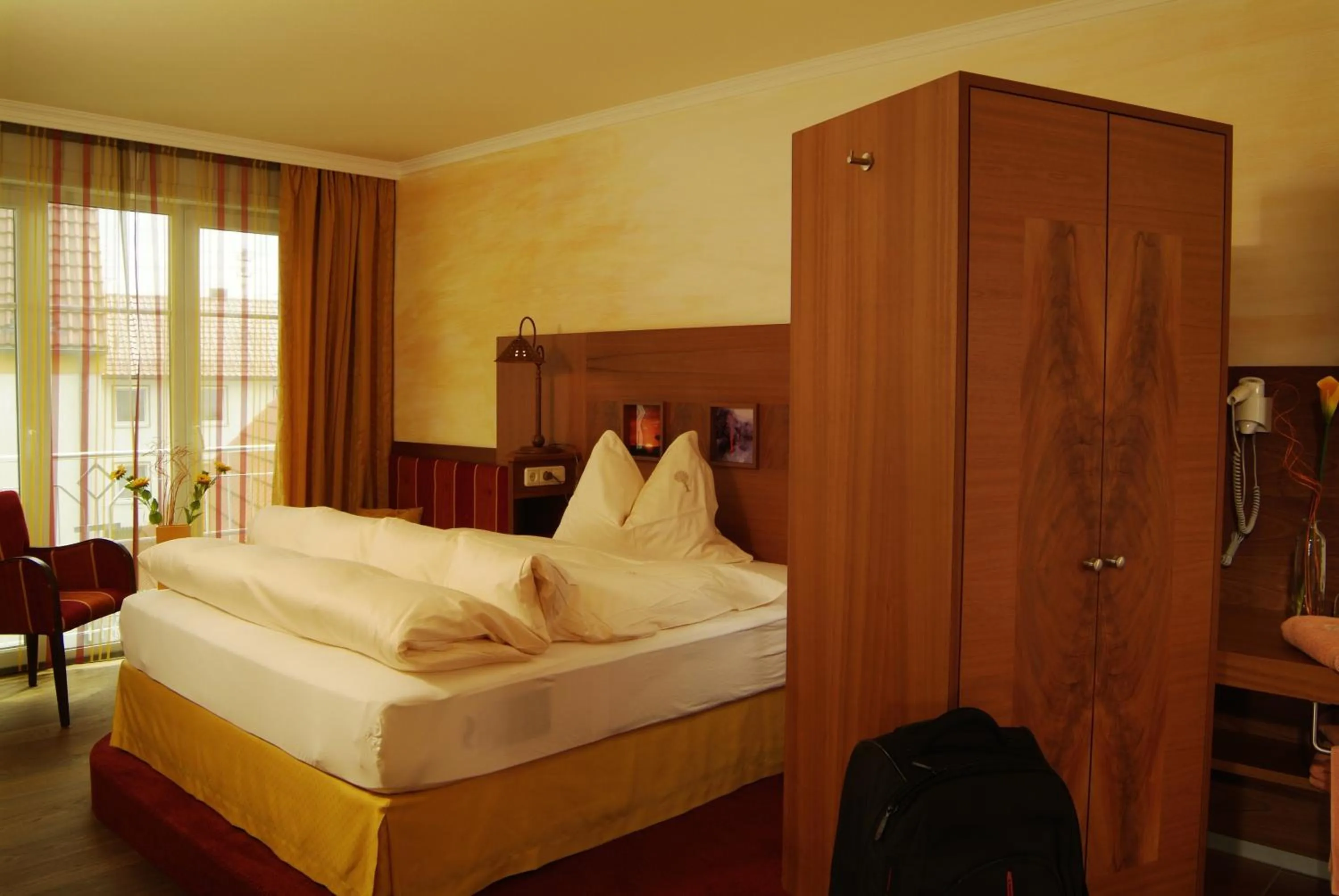 Photo of the whole room, Bed in Flair Hotel Zum Schwarzen Reiter